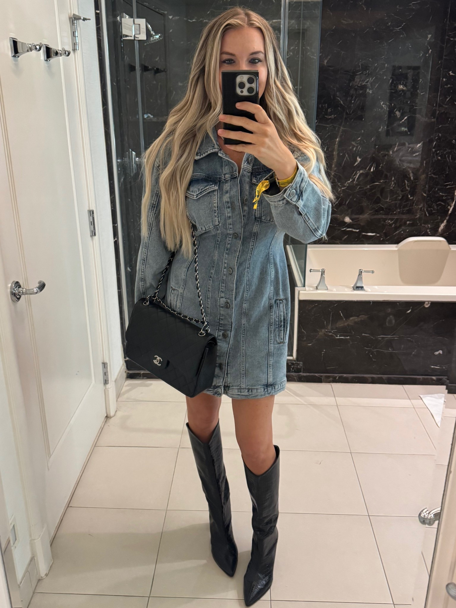 Denim dress and boots I wore during the day at Bravocon (bravocon wristband not tagged 🤪 … pro tip do not tighten it too much it can’t be loosened!)