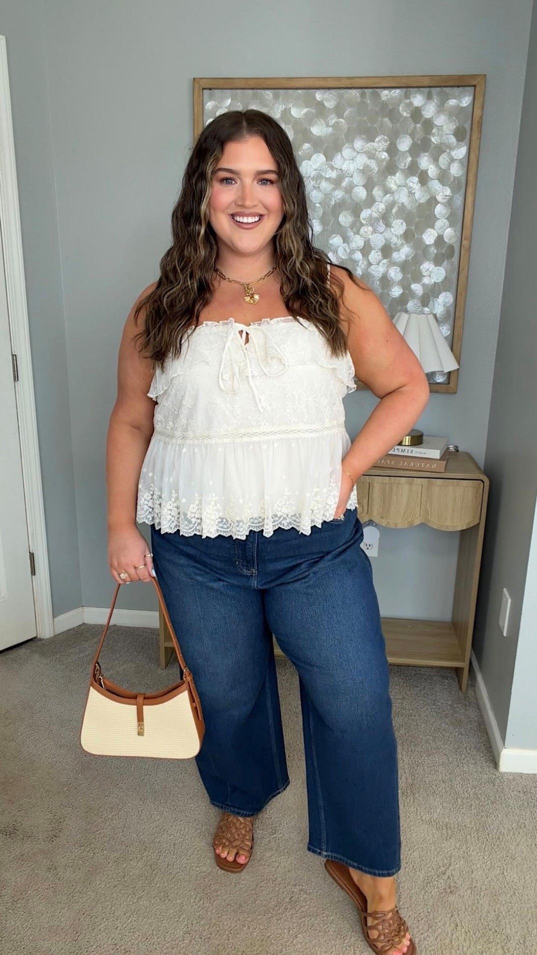I cannot get over this outfit for springtime. From the flowy lace fabric of this top, to the fit of these jeans and designer inspired sandals, I’m obsessed. This is a stunning look on every size of body and that makes me love this look even more. 
Lace tanktop, summer inspired handbag

#LTKSeasonal #LTKPlusSize