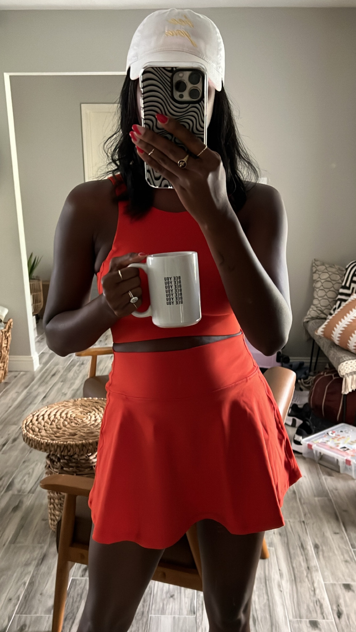 Outdoor or travel look! High neck sport bra, skirt with. Built in shorts, white baseball hat and bee you mug. 

#LTKunder100 #LTKfit #LTKtravel