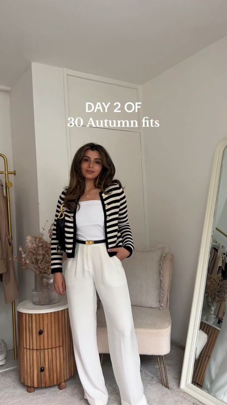 30 days of autumn outfits, day 2 🍂. i feel like this outfit leans more into transitional outfits going into fall. 

30 days of outfits, autumn outfit ideas, 
autumn outfits, autumn fashion, knit cardigan, autumn outfit inspo, uk fashion OOTD, knit cardigan, monochrome look, striped cardigan, Lily silk white silk trousers, black Hermes belt, white ankle boots, Dior saddle bag, modest outfit, casual outfit, smart casual fit, Parisian inspo, fall fashion, fall style trends, fall outfit inspo 

Fall styling video, 30 days of autumn outfits, 30 days of outfits challenge, 30 days of fall fits 

#LTKU #LTKVideo #LTKeurope