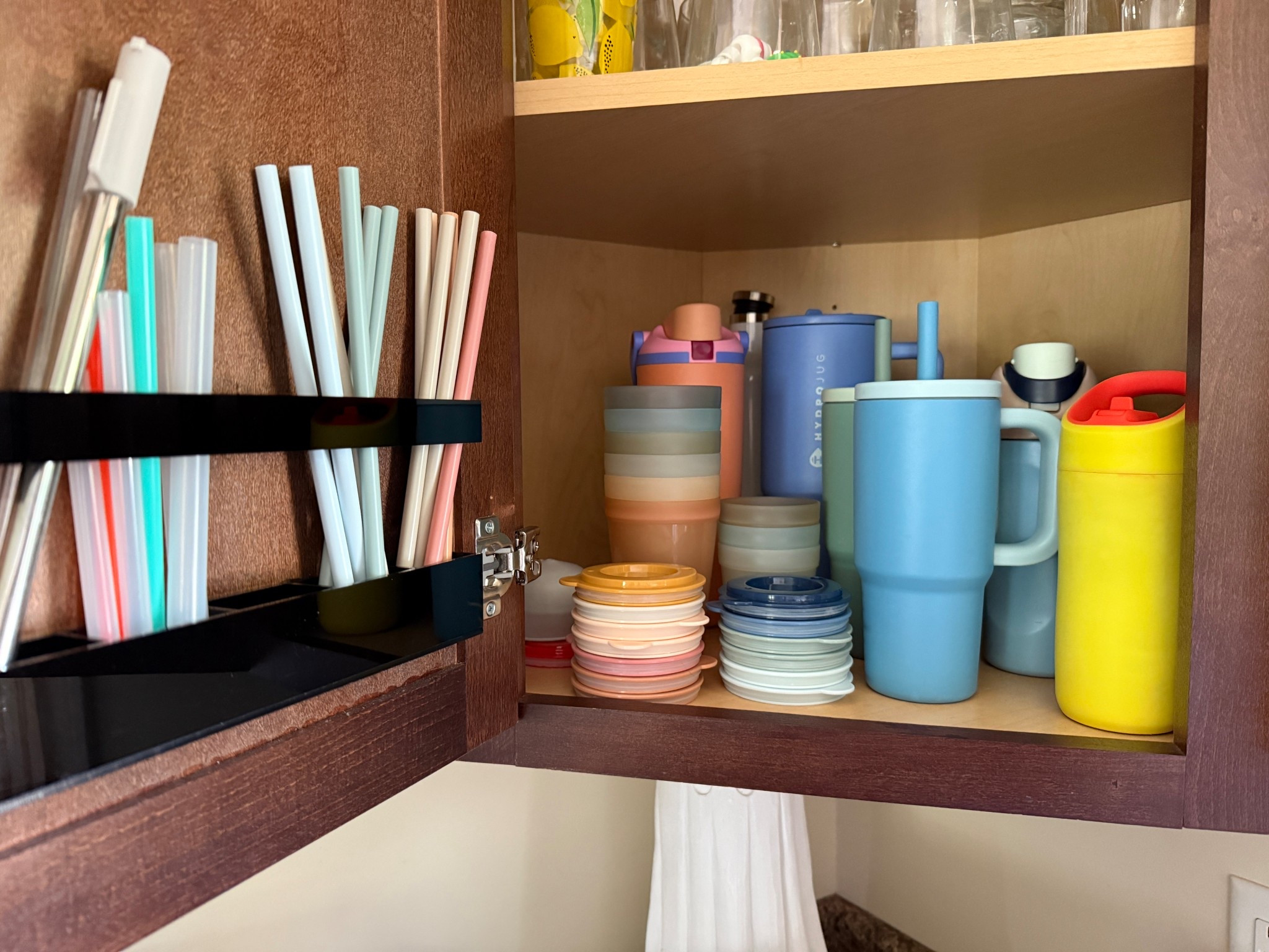 Kitchen cabinet organization - this acrylic straw holder is a game changer 

#LTKParties #LTKHome #LTKFamily