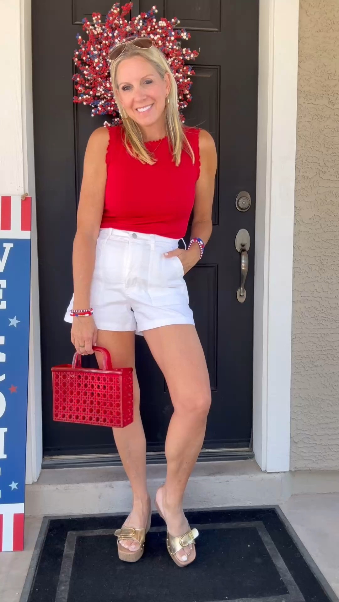 Red, white, and a little blue…love all the pieces in this cute little 4th outfit! 

The detail on the trim of this tank make it a steal for under $20! Other colors are also available. Wearing my usual size S tank, 4/27 utility pocket denim shorts, & 7 gold heeled buckle slides.