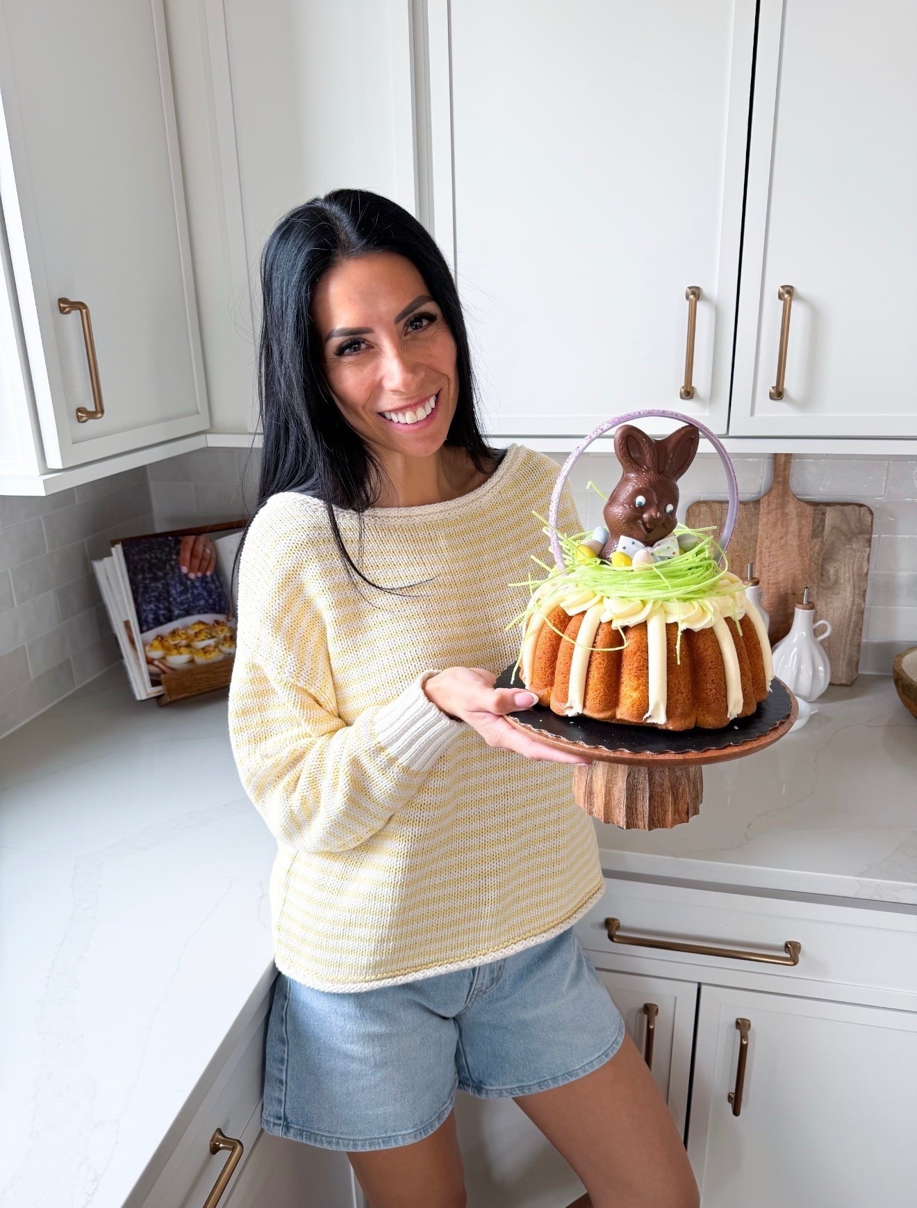 Upgrade your store bought cake or make your own this Easter! I love making this Easter basket Bundt cake, and it’s so easy. I linked everything you need but you can also make this easy recipe of mine:
🧺🪺 RECIPE 🪺🧺

Lemon-Blueberry Bundt Cake
• 1 box lemon cake mix
• 4 eggs
• 1 (3.4 oz) instant vanilla pudding
• ½ cup vegetable oil
• 1 cup hot water from the sink 
• 1 cup blueberries
• 1–2 tbsp flour
•1 tub of lemon or vanilla frosting 
•other supplies: Cadbury eggs, chocolate bunny, edible grass and head band 
Toss blueberries with flour. In a mixer, combine cake mix, pudding, eggs, oil and hot water (very warm, not boiling). Mix well, fold in blueberries. Pour into a greased Bundt pan and bake at 350° for 40 minutes. Cool completely.
Decorate with lemon or vanilla frosting, edible grass, a chocolate bunny in the center, and Cadbury eggs. Add a ribbon handle for a basket look. 

#LTKSeasonal #LTKfoodie