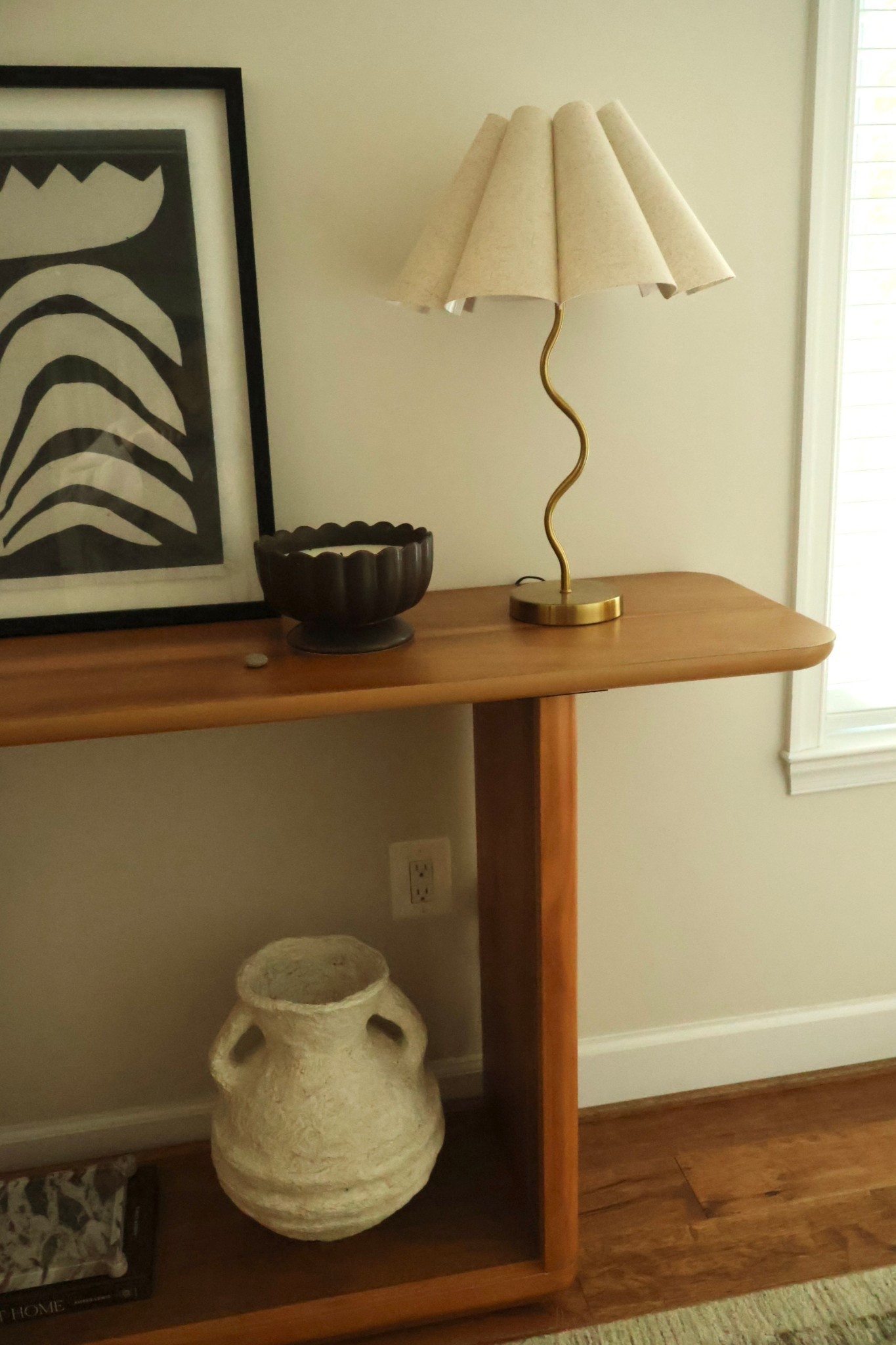 Earthy, organic, minimal home styling

Pedestal console table, amazon wavy lamp, paper maché vase, contrast wall art

#LTKHome #LTKFamily #LTKautumn
