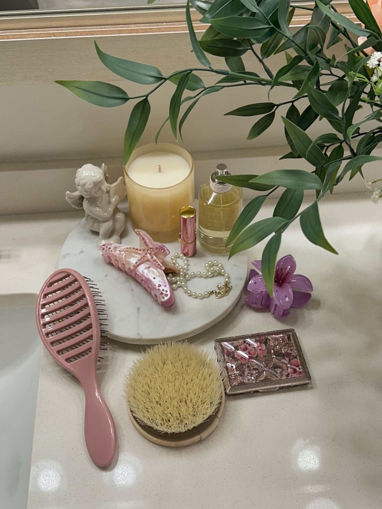 a girly bathroom decor moment 🤍🪞🪷 

[coquette style, feminine accessories, pink home decor, holiday gift ideas for her, vanity essentials, vanilla candle fragrance, pink hairbrush, marble tray] 

#LTKHome #LTKBeauty #LTKFindsUnder100