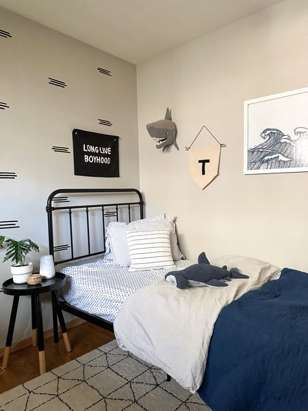 Toddler Boy Bedroom
Shark theme | black bed frame | rug | big boy room 

#LTKhome #LTKkids #LTKsalealert