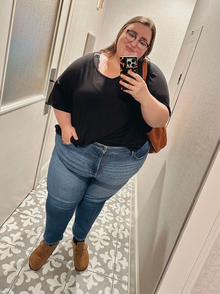 Plus size OOTD! Wearing a pair of Madewell jeans (size 28), a maurices t-shirt (4X), a bralette from Land Bryant (26/28), pair of clogs from Target (sized up 1 size since they didn't come in wide width), Amazon bag, and Warby Parker glasses! 

#LTKstyletip #LTKSeasonal #LTKplussize
