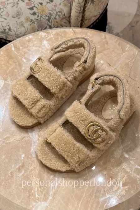 Dad sandals but make it winter ❄️ These #gucci em teddy sandals are available in tan and black, both with a $1,250 price tag. Hot! Or Hmm…?