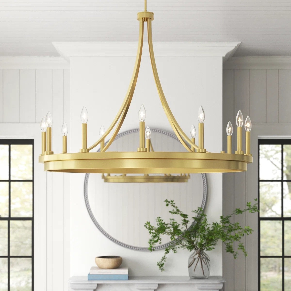 Inspired by modern farmhouse grandeur, the Marconi 12-Light Dimmable Wagon Wheel Chandelier combines dramatic scale, timeless design, and warm illumination to create a stunning focal point. Its circular wagon wheel silhouette and candle-style lighting bring both character and sophistication to any room. ON SALE and under $300.

Keywords:

* Marconi chandelier
* wagon wheel chandelier
* 12 light chandelier
* dimmable chandelier
* farmhouse chandelier
* modern farmhouse lighting
* dining room chandelier
* foyer chandelier
* living room lighting
* statement chandelier
* rustic chandelier
* candle style chandelier
* oversized lighting fixture
* ceiling light fixture
* warm ambient lighting
* luxury farmhouse décor
* high ceiling chandelier
* open concept lighting
* elegant home lighting
* rustic modern interiors

#LTKSaleAlert #LTKHome #LTKSeasonal