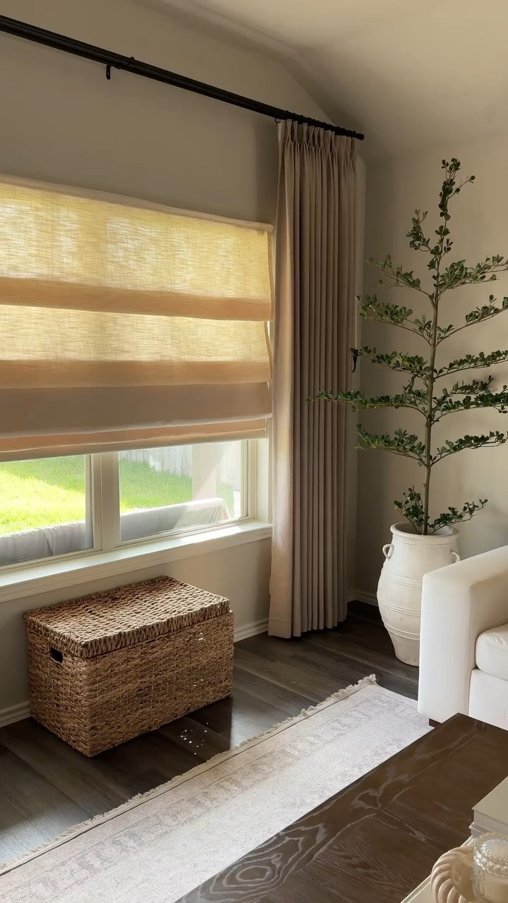 I swapped out our builder grade blinds for these custom pleated fold roman shades from @cozyology.curtains and they completely changed the feel of the space! I chose the Lena Linen fabric in Moonlight Beige with no liner for a soft, filtered light look, and they’re motorized so opening and closing them is as easy as pressing a button.
If you’ve been thinking about updating your windows, this is your sign 🤍 comment “shop” and i’ll send you the link 🫶🏼
#cozyologycurtains #romanshades #windowtreatments #homedecor #livingroominspo 

living room inspiration 
cozy home 
cozy home inspiration 
living room roman shades 
linen roman shades 
roman shades 
living room window upgrade 
builder grade upgrade 
home upgrade 
interior design 
home interiors 
cozy home interiors