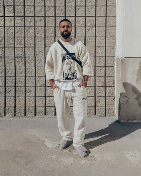 FEAR OF GOD 7th Collection Negro Leagues Sweatshirt in ‘Cream Heather’ (size M). ESSENTIALS Core Collection Relaxed Sweatpants in ‘Light Oatmeal’ (size M). FEAR OF GOD x BIRKENSTOCK Los Feliz sandals in ‘Cement’ (size 41). FEAR OF GOD x BARTON PERREIRA glasses in ‘Matte Taupe’. THE ROW Slouchy Banana Bag in ‘Black’. A relaxed and elevated men’s look that’s got light tones for a Spring day out. 

#LTKstyletip #LTKmens