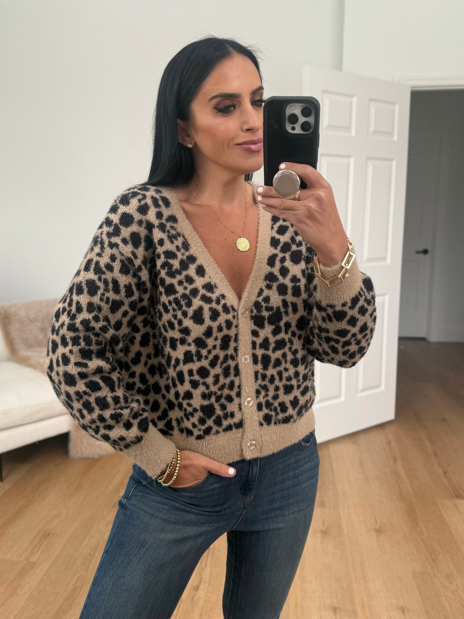 Jessica Simpson Women's Dionne Eyelash Cardigan Sweater color leopard wearing size small. 
