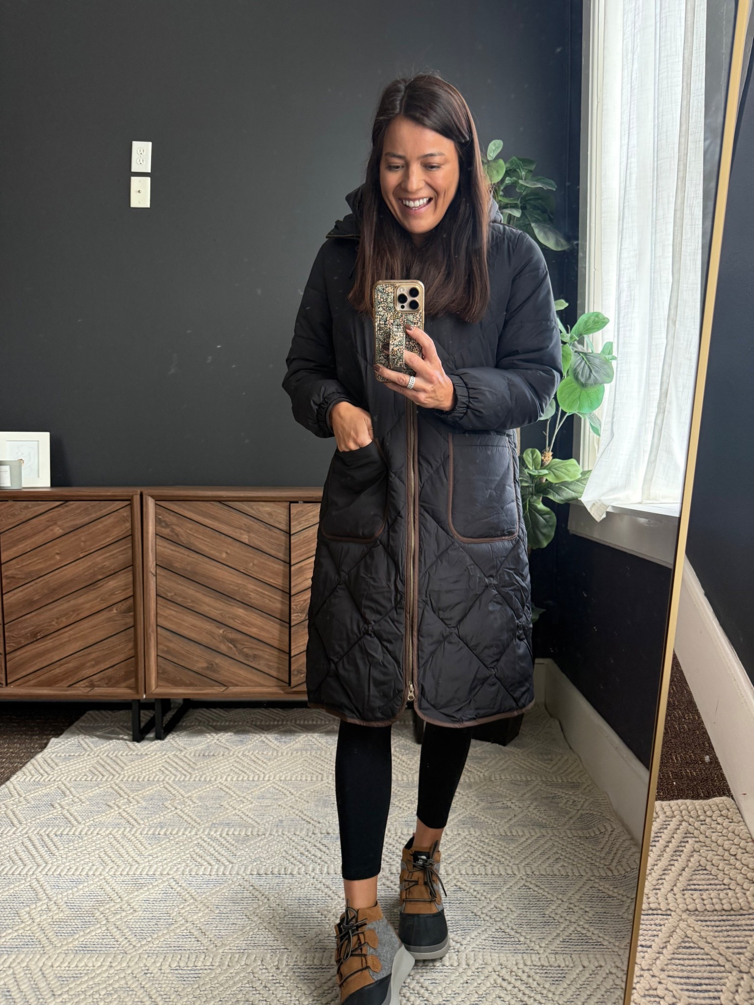 The perfect winter coat. 🤌🏽 It’s not puffy, long enough for butt coverage and keeps you warm in temps as low as -17. Love the brown detail on this one! 50% off right now with code BREEZYY

#LTKSeasonal
