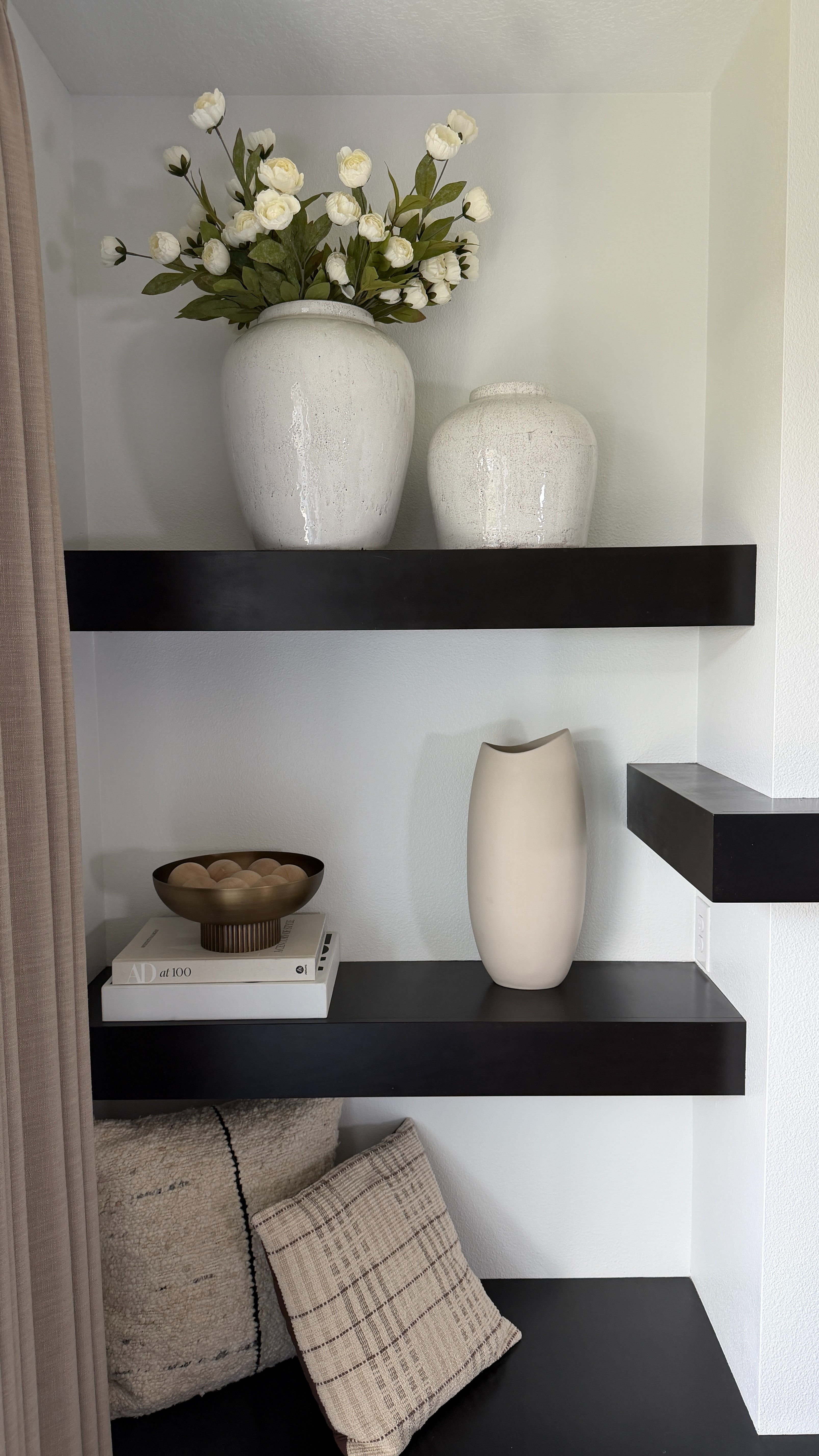 Neutral shelf decor with stunning peony stems and beautiful vases. 🤍 Such an easy way to make shelves feel styled but still simple. 

 #LTKHome