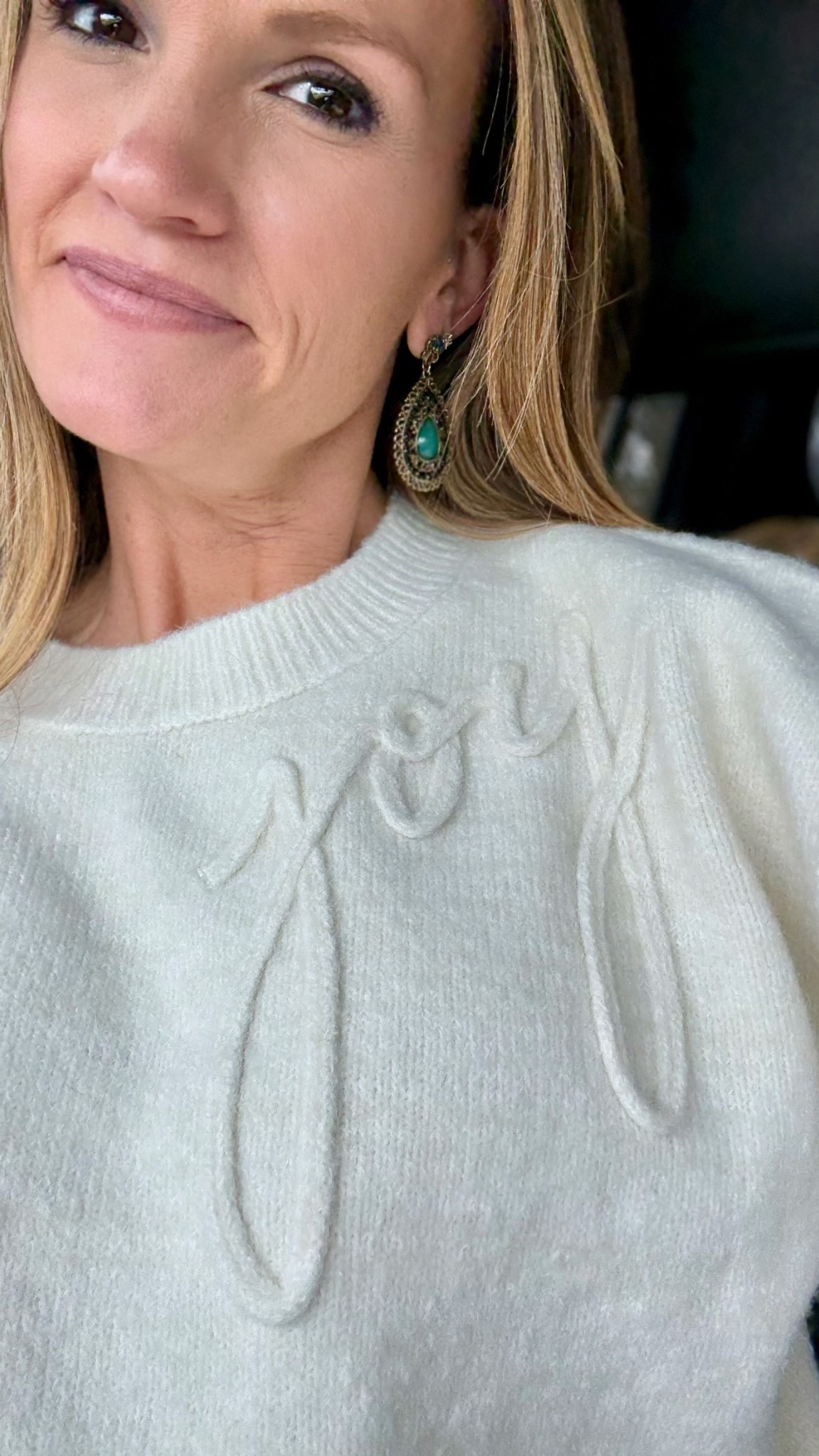 The cutest sweater for your Christmas party gathering or event! I paired it with a green pleated midi skirt and booties for a Santa brunch and jeans for a family Christmas party!

#LTKHoliday #LTKootd #LTKFindsUnder50