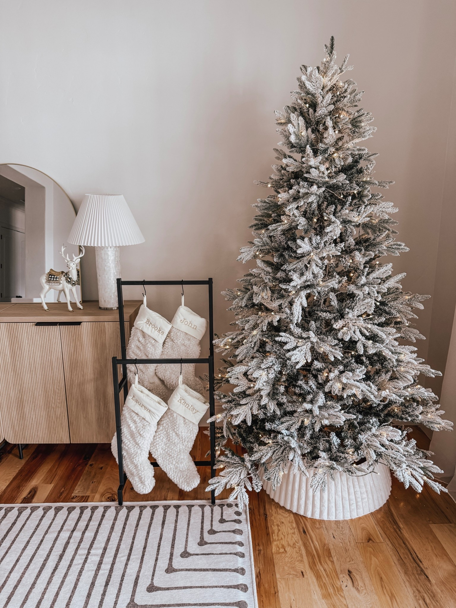 Create a cozy holiday space with this flocked tree and neutral decorations!

#LTKHoliday #LTKSeasonal
