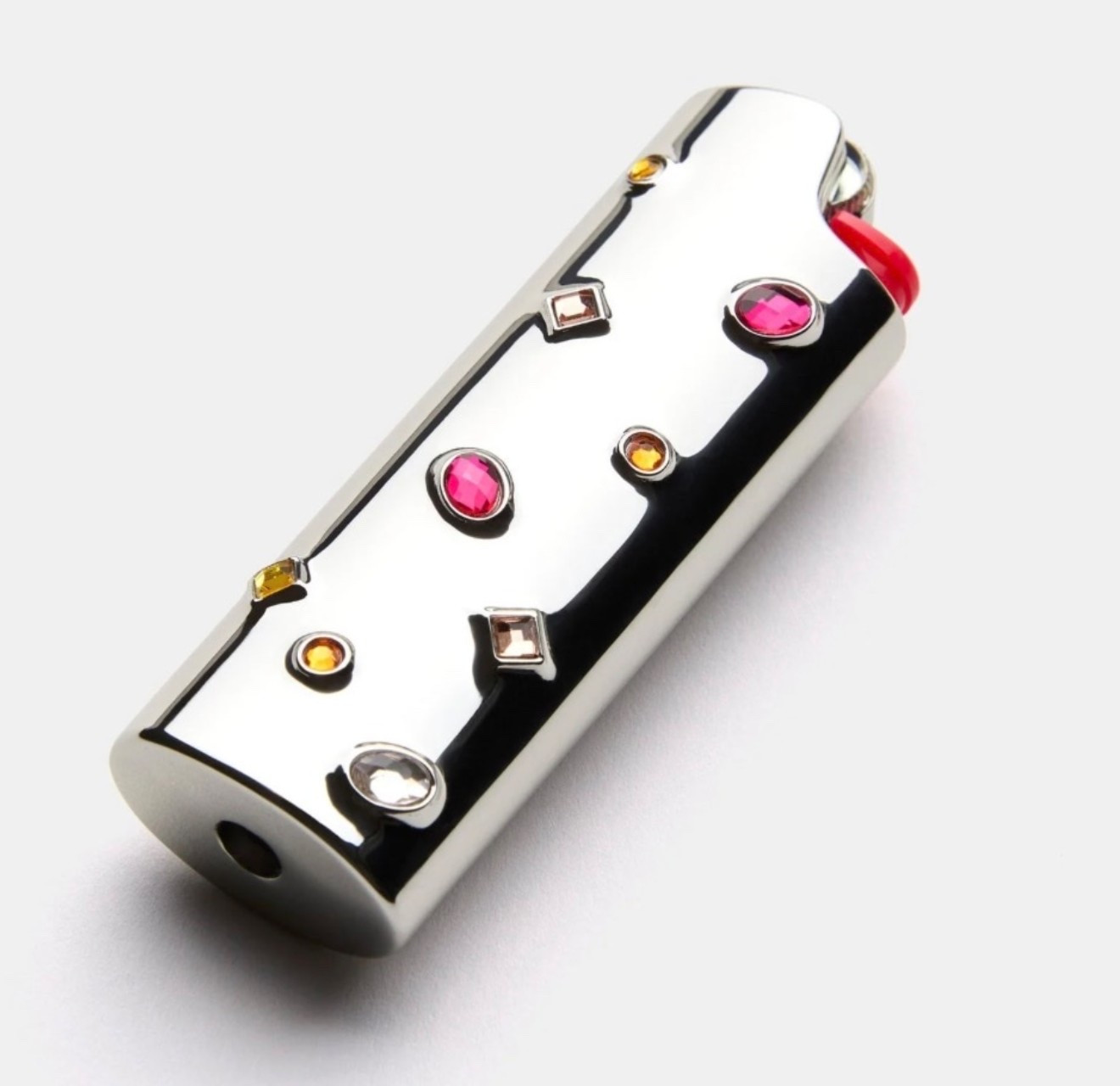 LITTLE GEMS LIGHTER CASE
IN PINK SILVER

you will. Add shine to your lighter with a Little Gems lighter cover. Our handheld lighter sleeve, encrusted with twinkling glass cabochons, is a sleek and show stopping lighter case to add to your smoking accessories collection. Suited for a standard sized bic lighter.

#LTKHome #LTKmomlife