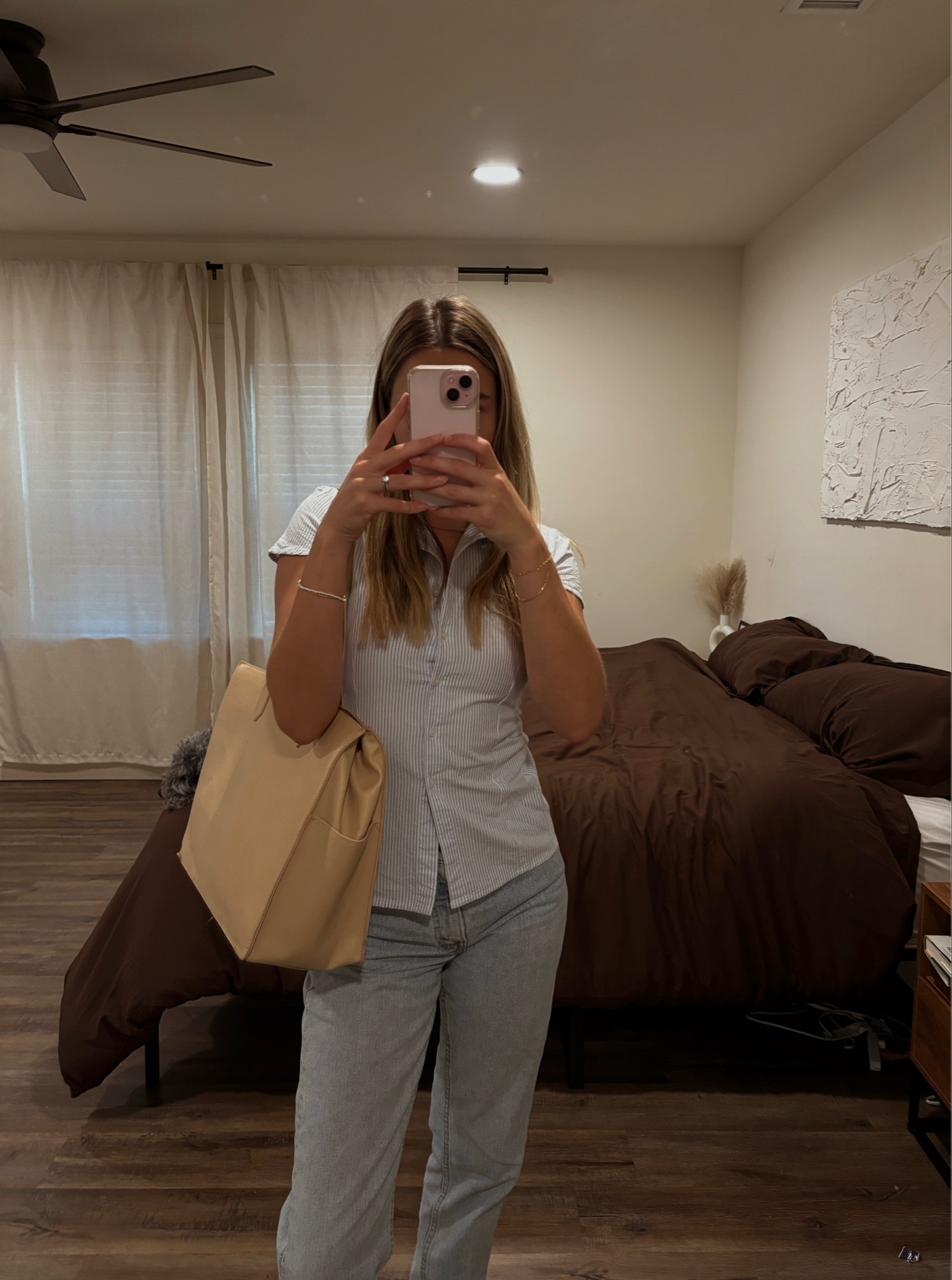 Loving this classic work look 💼 Wearing a light blue pin-stripe short-sleeve button-up from Brandy Melville.

It’s fitted and so easy to style. Paired it with my Beis work tote, which fits everything I need for the office and keeps the outfit feeling effortless and put together. 

#LTKTravel #LTKParties #LTKWorkwear