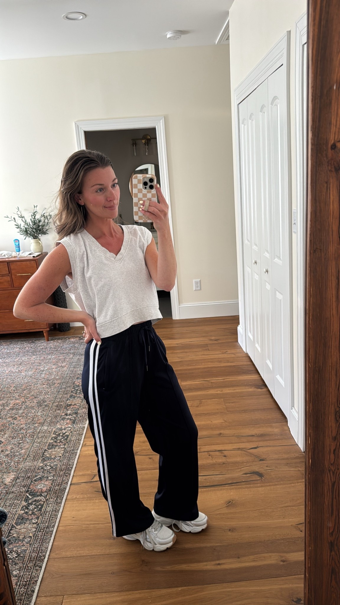 Love these track pants! They come in different lengths as well. I’m in the shorter version but could have done the regular one too. I sized up to a medium!