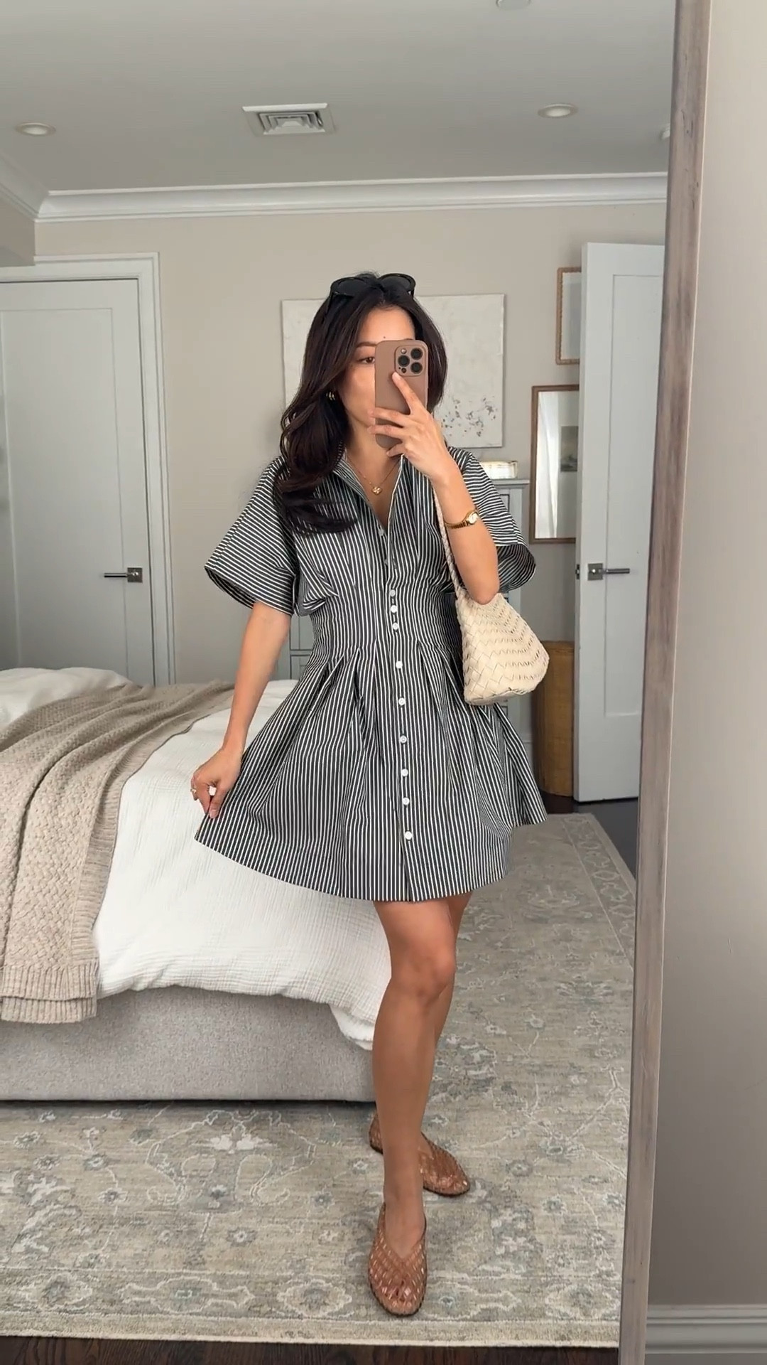 One of my most flattering dress styles

• Anthropologie tobie dress xxs petite - this print runs TTS, very flattering. 

I have an older color from last year and wore it so much! I machine wash cold and hanging it to air dry - it dries pretty quickly with almost no wrinkles, travels well. 

I wear cotton bike shorts under mini skirts like this. If you want a slightly longer length, I would try regular sizing. 

• Dolce Vita jelly flats in Mocha size 5, size down if between sizes.

• Woven shoulder bag with liner

Petite friendly dresses, casual spring outfit ideas, mom style 

#LTKSeasonal #LTKPetite #LTKootd