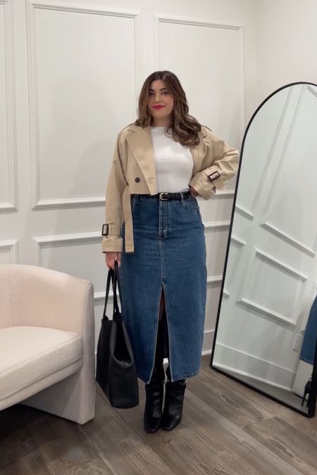 Styling the most comfortable and flattering denim midi skirt with a white top, a cropped trench coat, black boots, a black and gold belt with a black leather tote bag. The skirt fits true to size and has a good amount of stretch! The brand is Rolla’s and I grabbed it from Nordstrom 💗

#LTKmidsize #LTKstyletip #LTKSeasonal