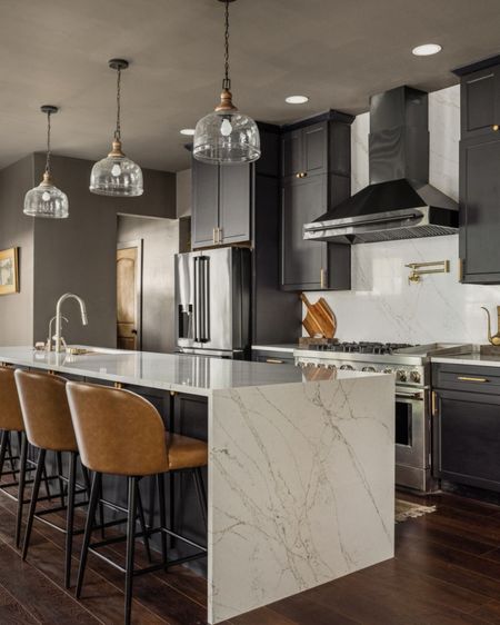 The light countertops brighten up the moody kitchen space.

#LTKhome