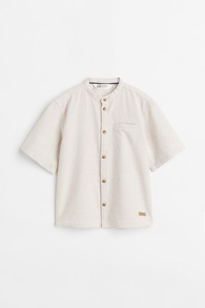 Relaxed-fit shirt in soft, woven cotton fabric. Band collar, double-layered yoke at back, an open... | H&M (US + CA)