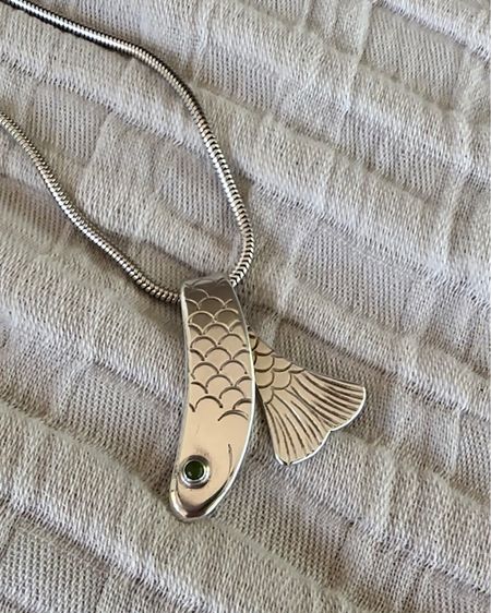 Eden Hand Arts fish necklace - I’m unable to find any of this exact necklace secondhand, but I have linked the populate herring fish cuff  bracelet 

Secondhand jewelry // silver jewelry // animal jewelry // fish jewelry 