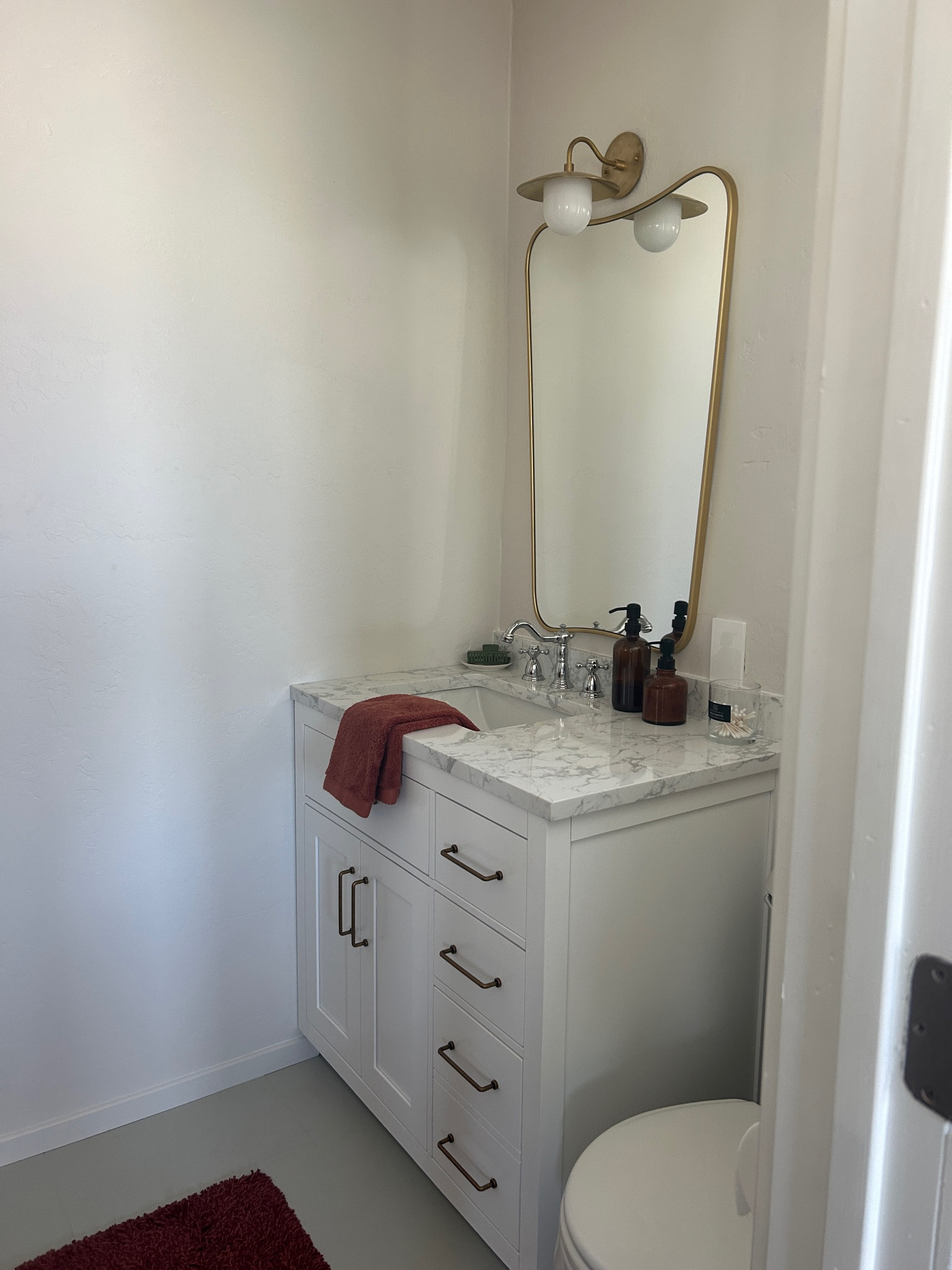 Bath remodel part 2!! Help! Aged brass pulls? Or polished?

#LTKHome