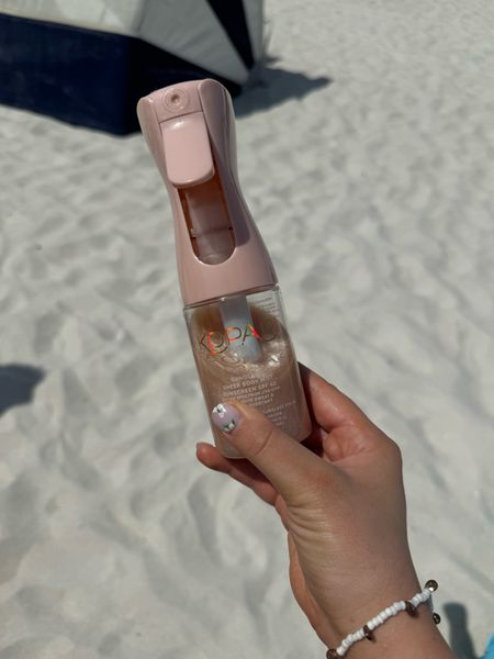 the BEST sunscreen that smells SO good & shimmery 
