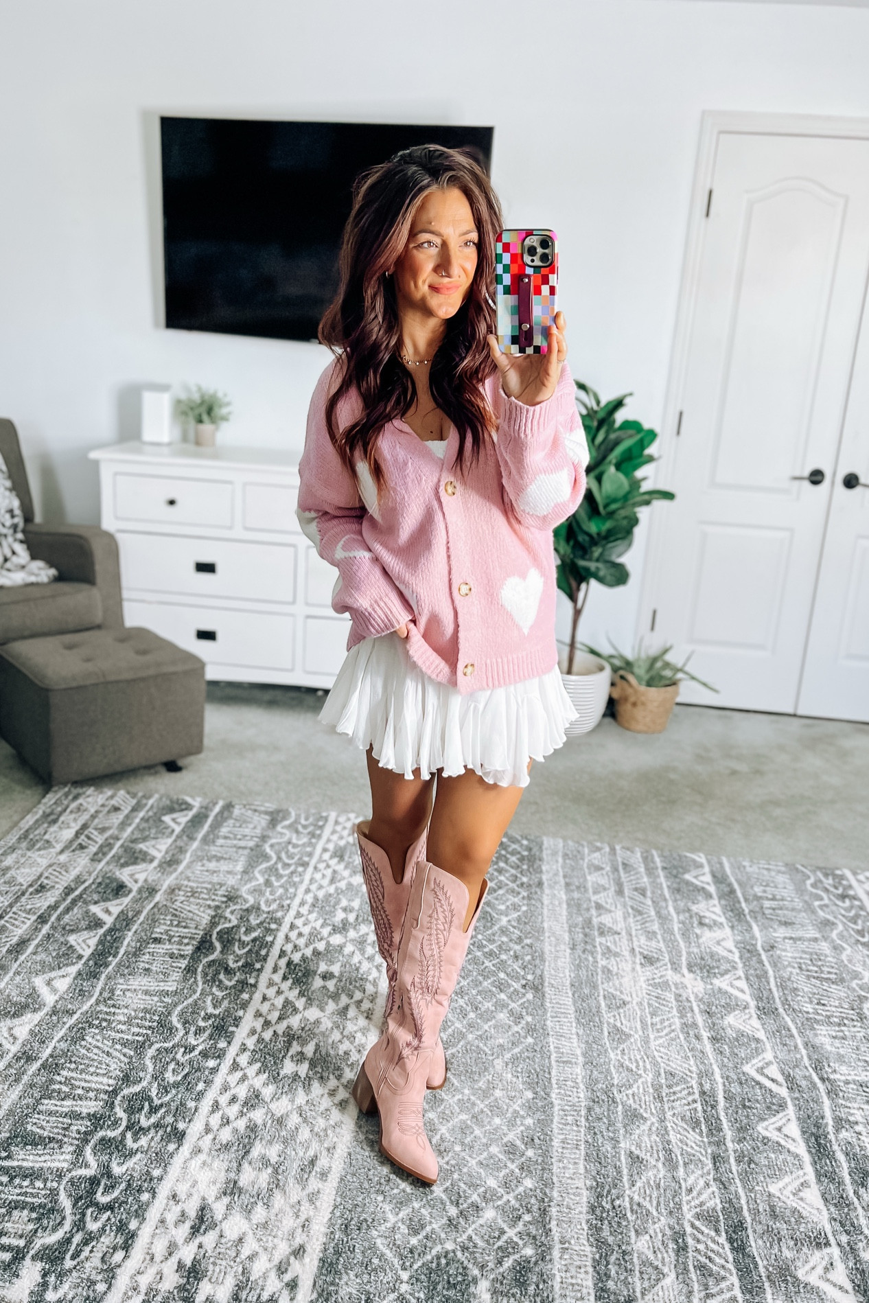 The cutest girly Valentine’s Day or galentines outfit 💕 the oversized fit of the cardi is perfect for this look! Size up half in the boots. 

#LTKStyleTip #LTKSeasonal #LTKFindsUnder50