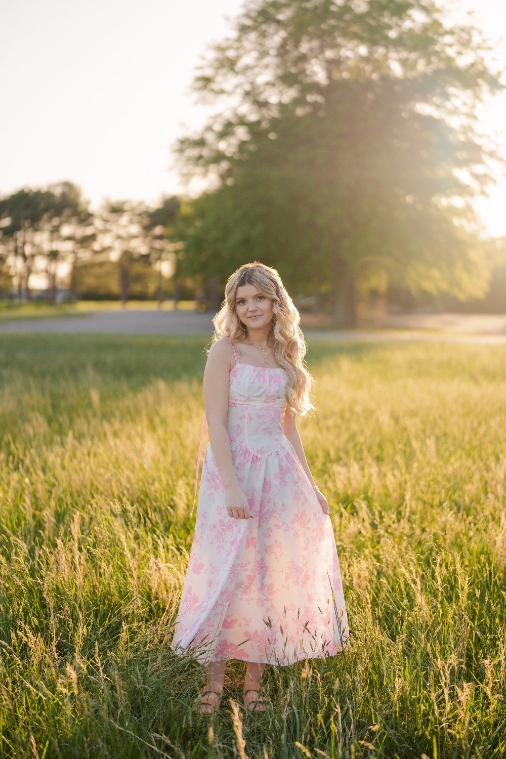 This pink floral dress is giving garden party meets golden hour 🌸☀️
It flowed so beautifully in the breeze and looked dreamy in every single frame.
I linked similar floral dresses on LTK — perfect for senior portraits, spring formals, or summer events! 

 
