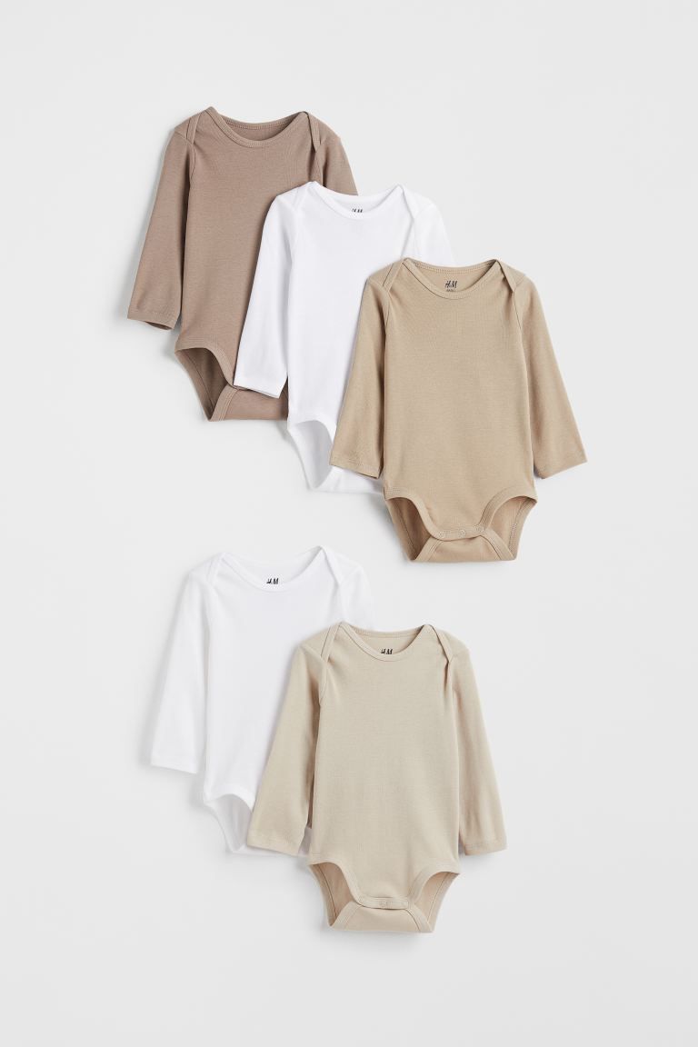 Conscious choice  Long-sleeved bodysuits in soft, organic cotton jersey with snap fasteners at gu... | H&M (US + CA)
