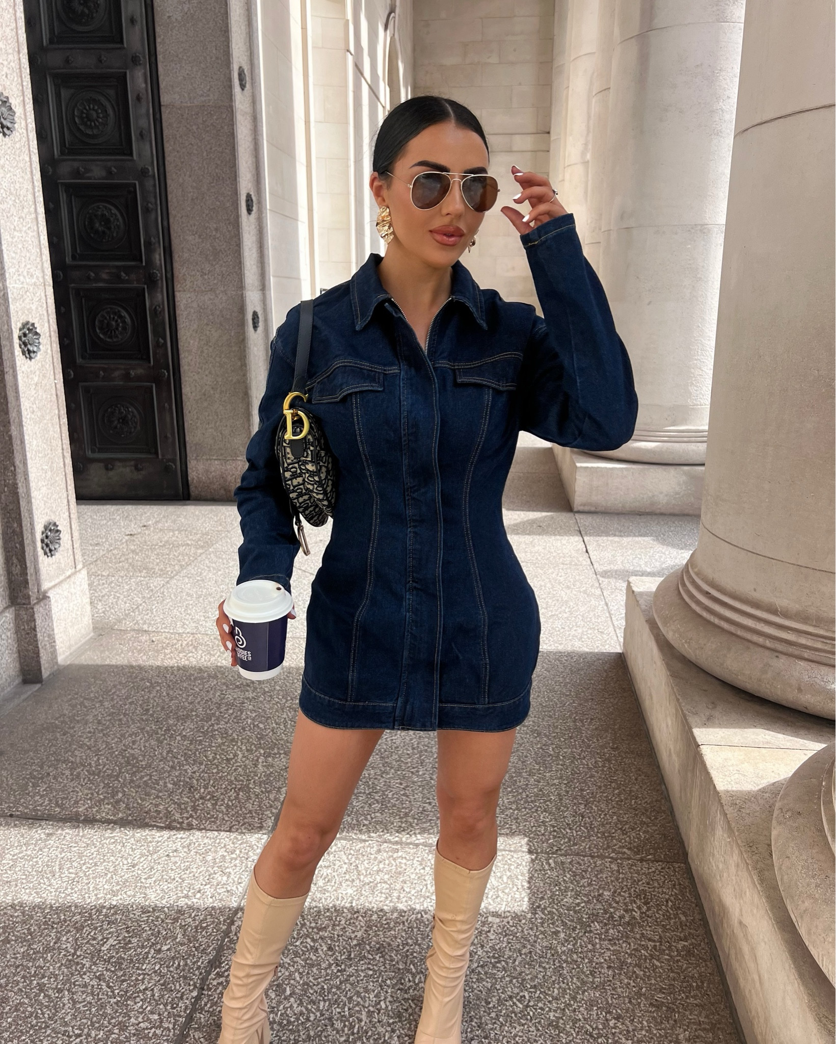 Denim done right 🤎 Styled this dark wash denim shirt dress with knee-high nude boots for that perfect autumn transition vibe 🍂 Added a statement designer bag + oversized sunnies to elevate the look. A cosy but polished outfit for coffee runs & city strolls this season.

#LTKuk #LTKstyletip #LTKautumn