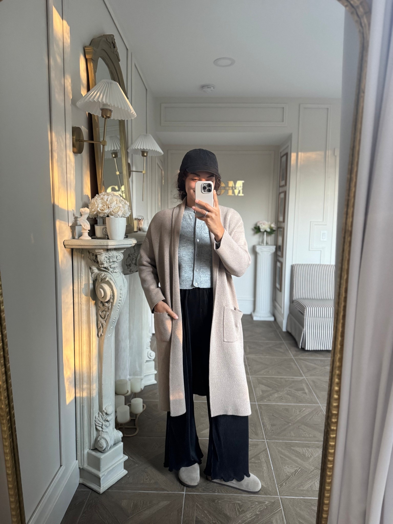 Cozy casual outfit for a fall day: wide leg pull on pants, cardigan, sweater coat/long sweater cardigan, baseball hat, and clogs 

#LTKStyleTip #LTKSeasonal