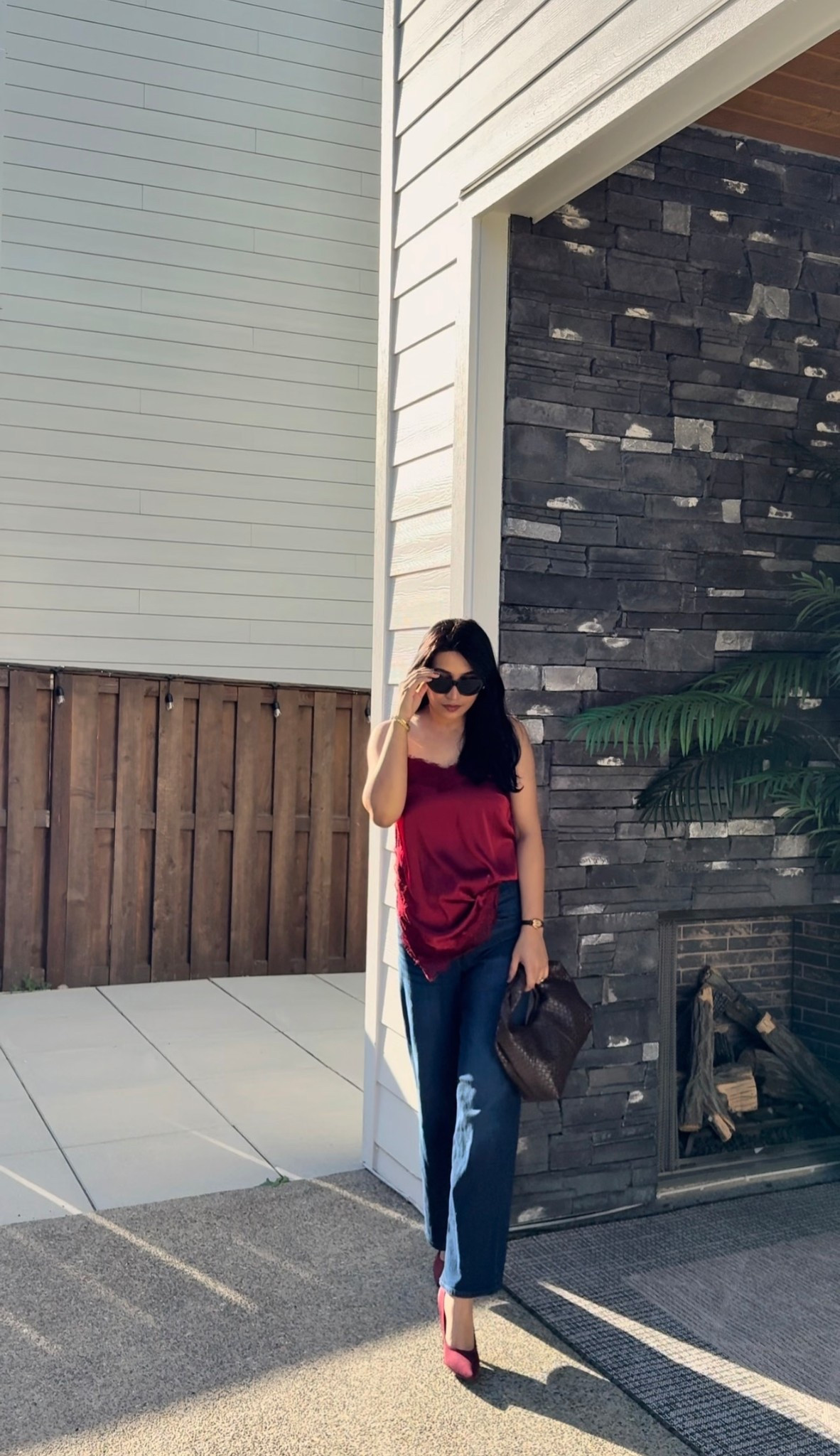 Satin top, burgundy top, wide leg jeans, brown bag #springoutfit

#LTKPetite #LTKgrwm
