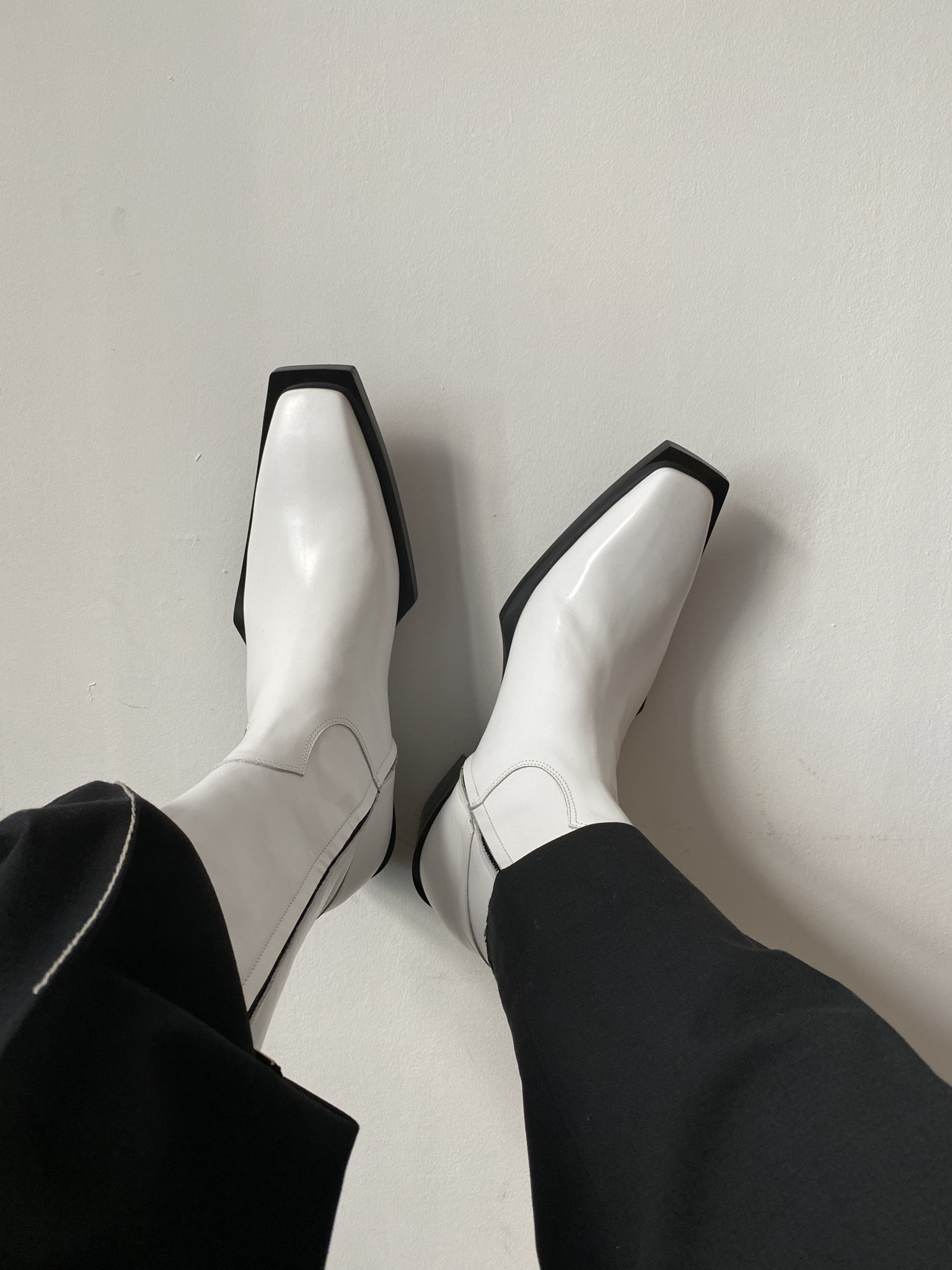 White cowboy boots.

#LTKmens #LTKAsia #LTKeurope