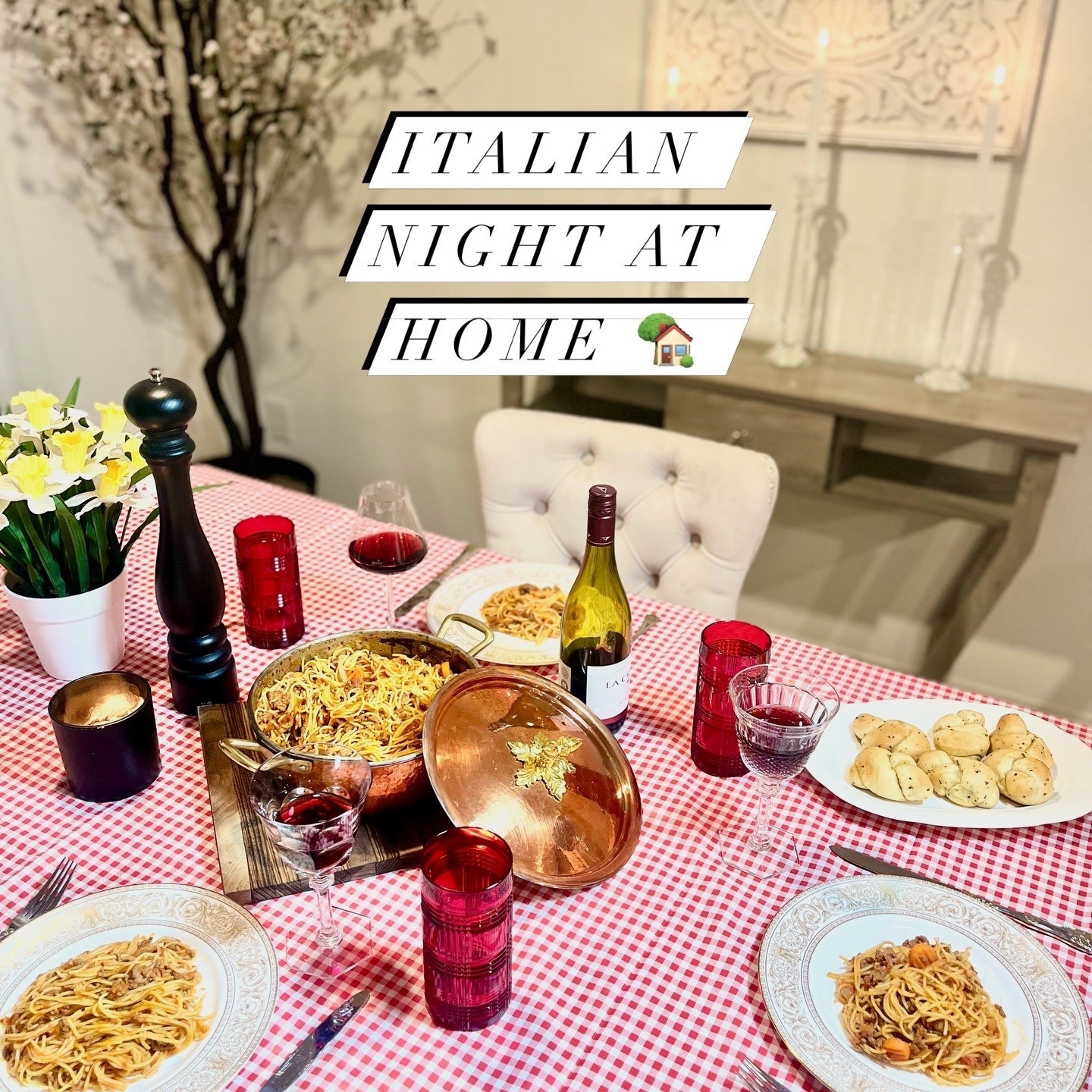 A simple Sunday dinner ~ Italian themed. 

I was craving pasta so i decided to pour a glass of red wine while making a homemade bolognese sauce with thin spaghetti noodles. Cooked the sauce on low for about 3 hours in my favorite copper pan. Paired it with garlic knots because my son adores them. Decorated the table with a red and white gingham picnic tablecloth I had on hand from a camping trip that never happened. These are kind of simple dinners made at home I really enjoy making. No noisy restaurant required. My favorite way to spend a Sunday.