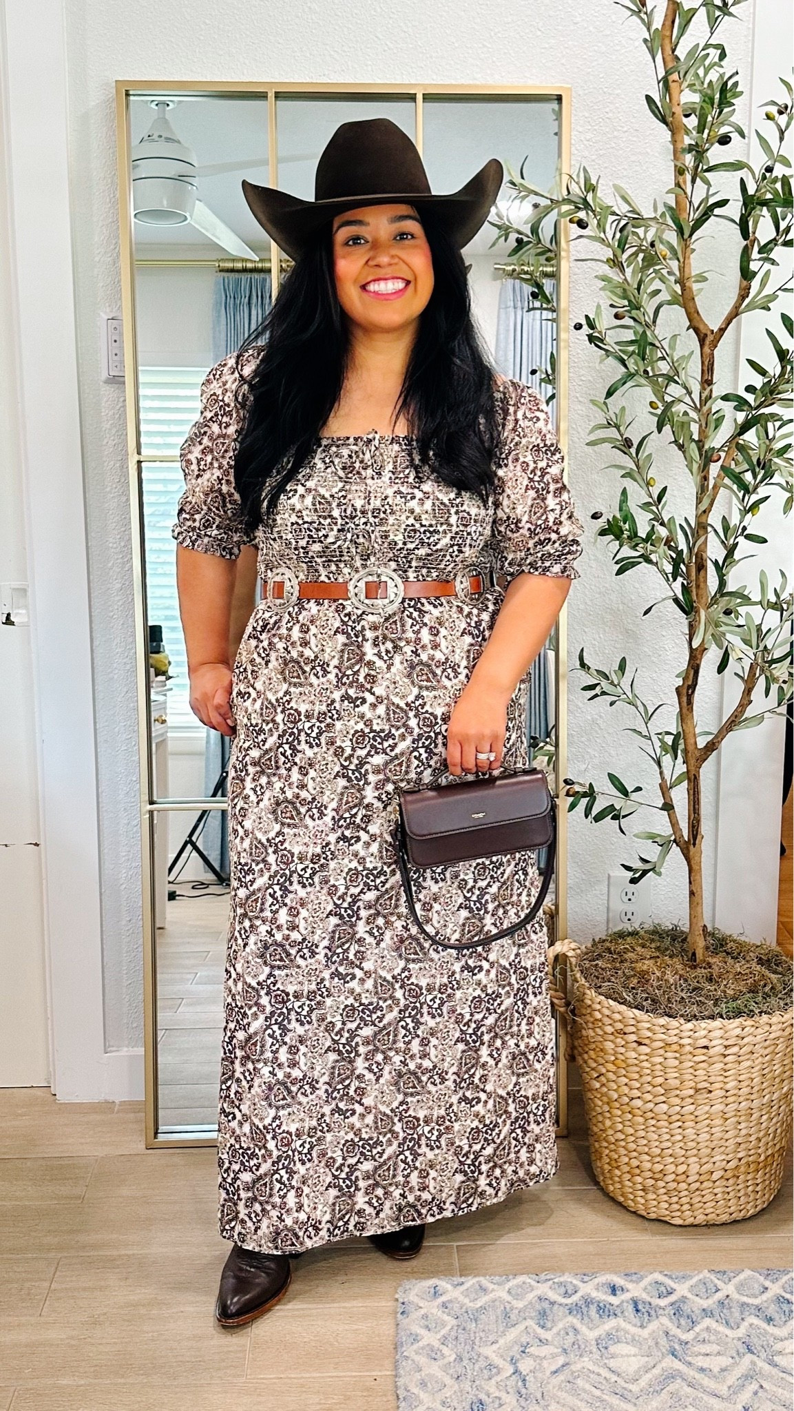 This maxi dress by @hillhousehome gifted to me at LTKCON and it makes me feel so fall! It’s from their newest fall collection and I love that it of course is chocolate brown. I’m wearing an XL and I feel like the sizing runs on the smaller side in this dress IMO, so I would size up if you’re in between sizes or fuller chested . 

My boots are the Juany boot from Rockem and are also available in Black!

My purse is a new arrival from @coach available at Macy’s and was one of my two fall handbag purchases of this season!

🎀It’s also where I post daily outfits, home decor finds, my favorite makeup/haircare products, etc. 

petite fall fashion, petite fall outfits, petite fashion, petite style, petite outfit ideas, petite fashion over 40, midsize fashion, midsize fall fashion, midsize fall outfits, midsize outfit ideas, transitional fall outfits, fall layering ideas, what to wear this fall, fall fashion trends 2026 chocolate brown fall outfit, plaid fall outfit,  suede fall outfit,  fall preppy outfit, fall jewel tones, fall neutrals, fall layering, fall boots outfit, smiles and pearls

#LTKootd #LTKPetite #LTKOver40