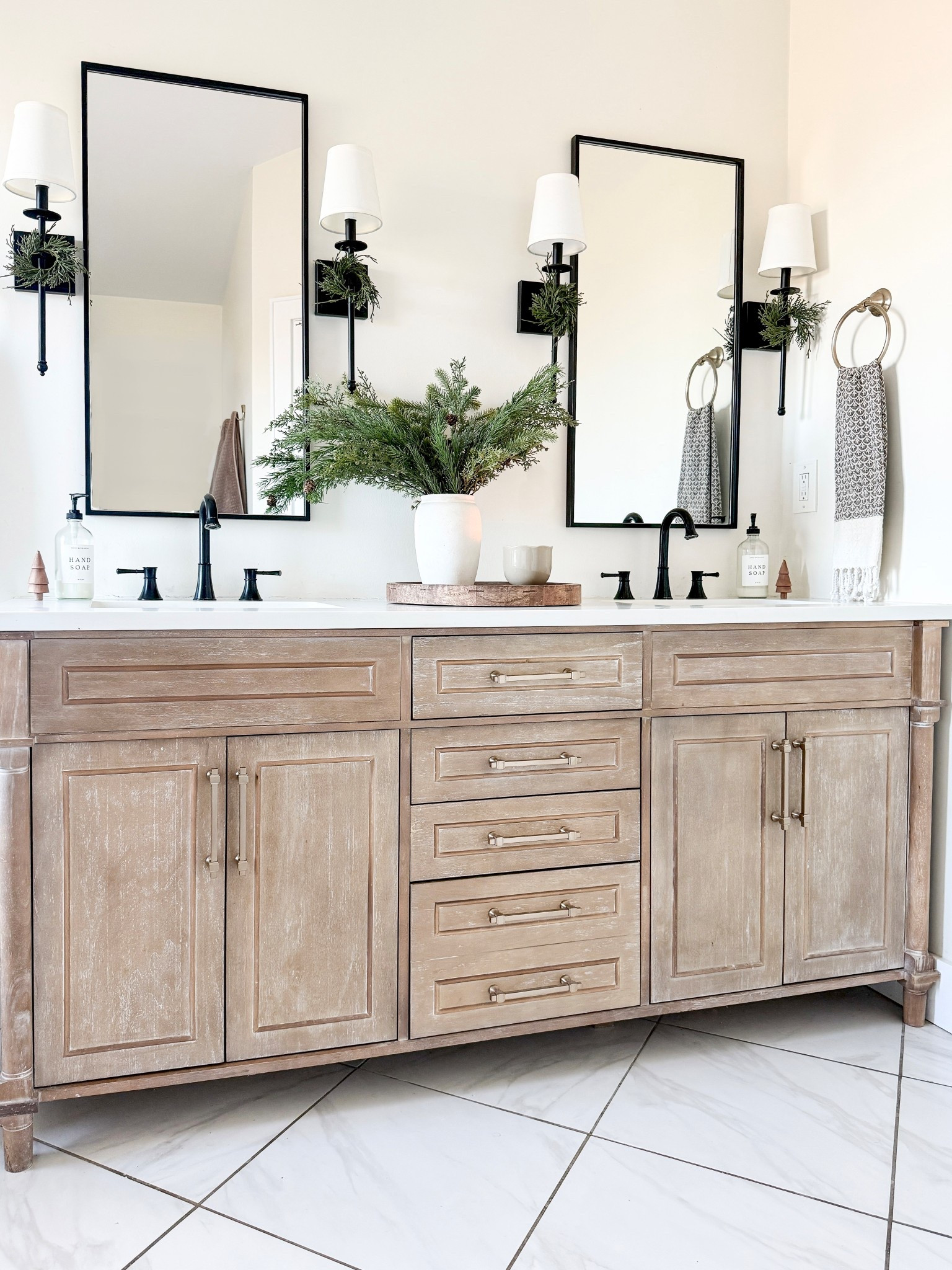 Simple winter bathroom, bathroom vanity, bathroom cabinet, wall mirror, wall sconces, bathroom lighting, bath towels, bathroom faucet, champagne bronze, bathroom decor 

#LTKFindsUnder50 #LTKSaleAlert #LTKHome