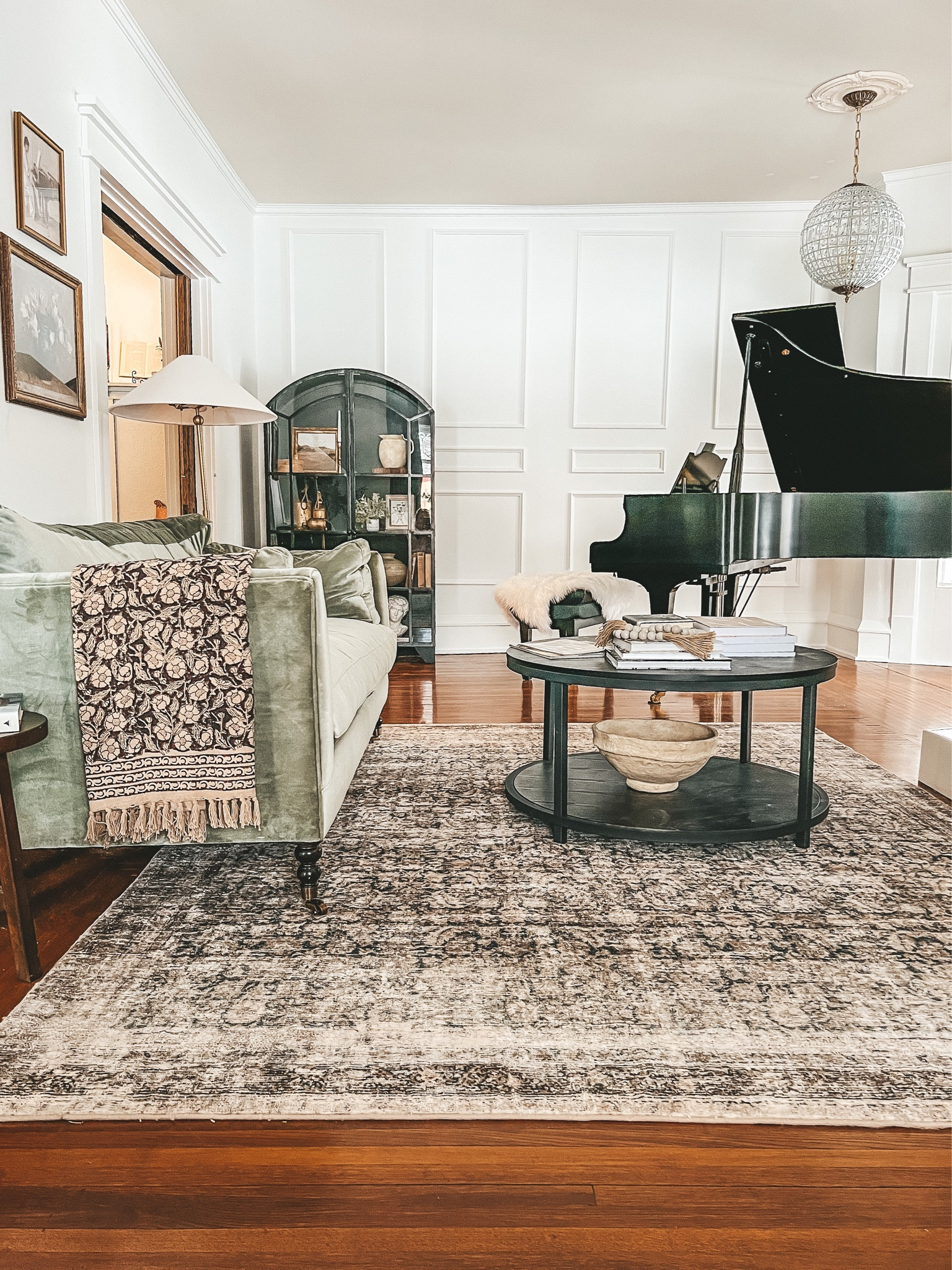 Shop my living room! Velvet sofa, Loloi x Amber Lewis rug, coffee table, storage cabinet, table lamp and throw. 

#LTKhome #LTKstyletip