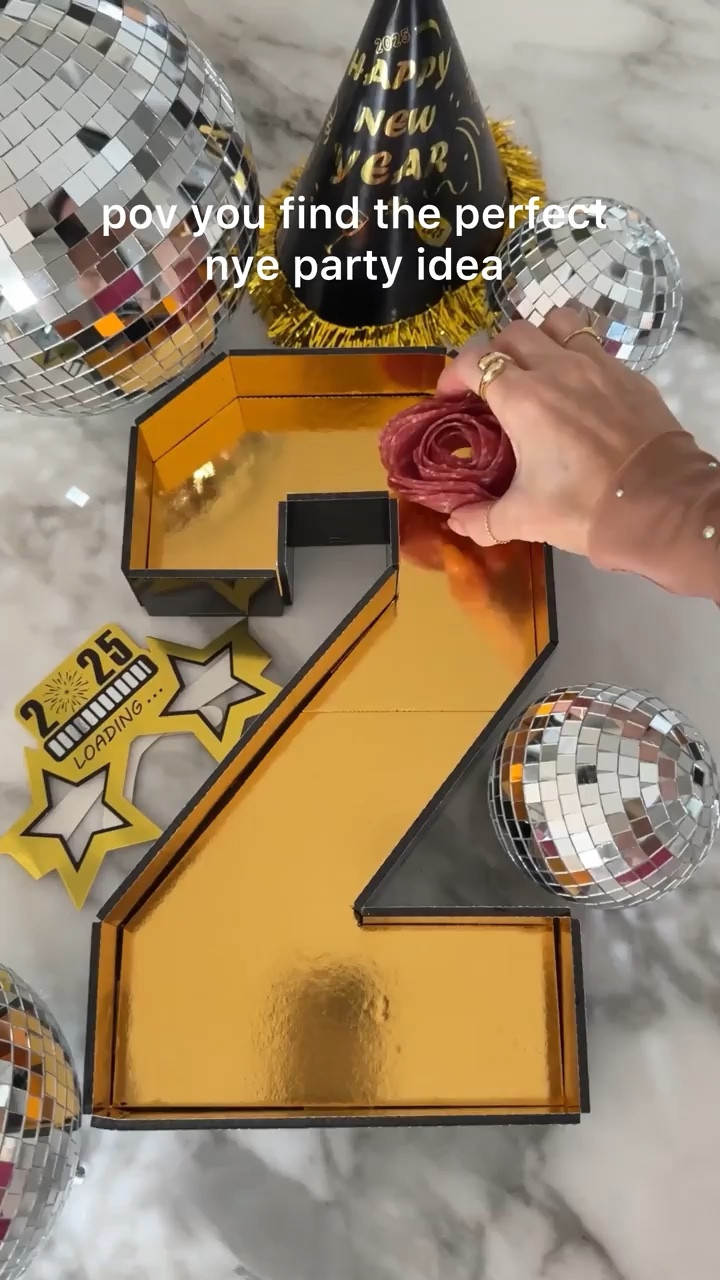 The perfect NYE charcuterie board for party planning!

#LTKHome #LTKSeasonal