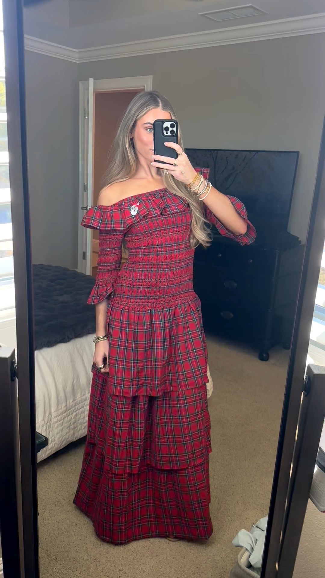 My Christmas outfit! My dress is from shop.confete and my shoes are my tkees sandals. Wrap yourself in cozy elegance with this statement making dress for the gals looking for the cool girl holiday party dress.  The Nicoletta Maxi Dress from Sugarlips is a classic red plaid dress that features an off-the-shoulder neckline, smocked bodice, and long sleeves for added warmth. The tiered skirt flows beautifully, making it perfect for fall gatherings or holiday parties. Pair with heeled boots and a structured bag, or elevate with strappy heels and bold earrings.



#LTKHoliday #LTKootd #LTKFindsUnder100