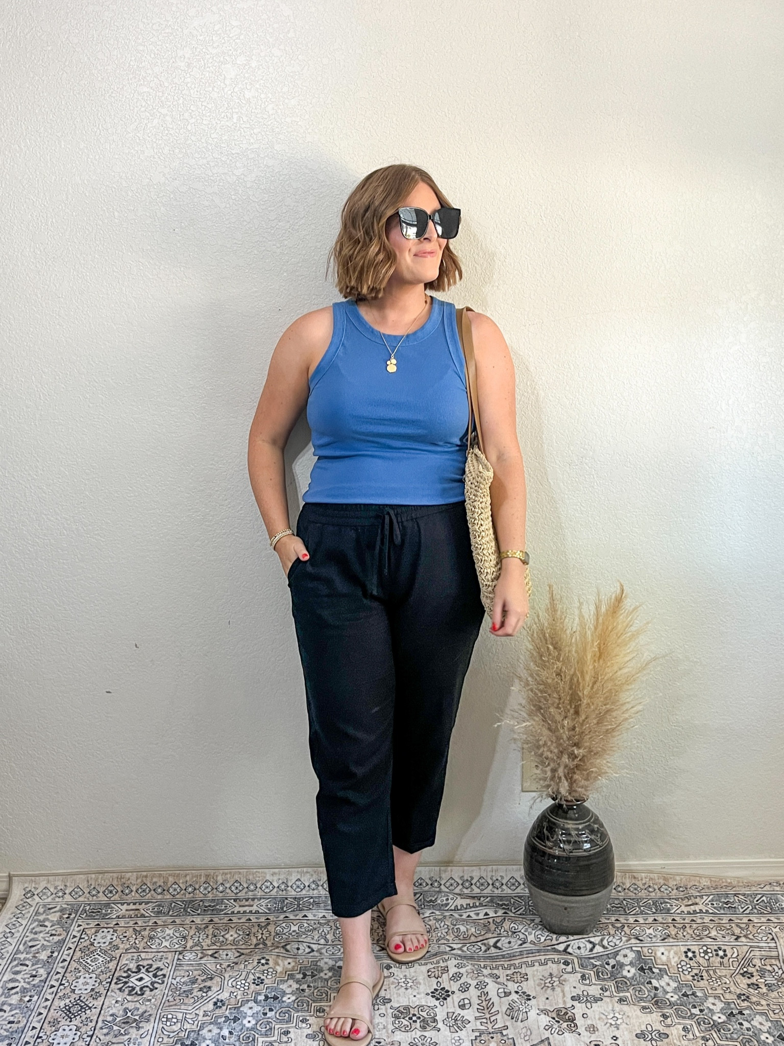 Summer Outfit// simple but necessary when it’s over 100 degrees! 

To keep the outfit interesting, I added a pop of color and a straw bag for texture!

Tank L (tts)
Pants 10 classic (tts) I’m 5’4
Sandals size up 1/2 size 

#LTKMidsize #LTKStyleTip #LTKSummerSales