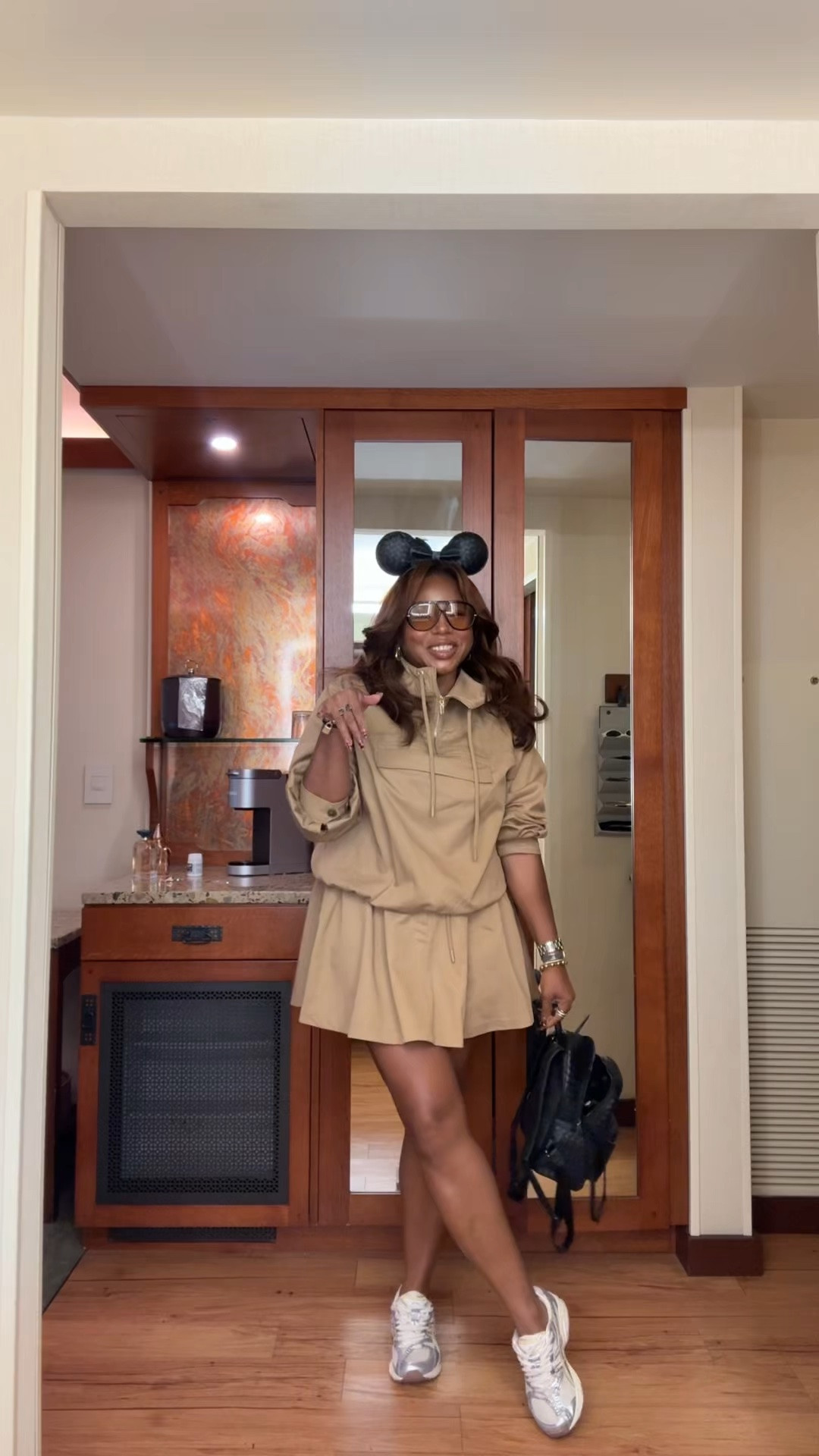 A matching set that understood the assignment.

I love that this khaki matching skirt set comes with a hooded anorak pullover instead of a basic jacket. An anorak is basically a hooded pullover jacket, so it feels sporty, functional, and more styled.

I accessorized mine for a day at Disneyland, but it also works for travel days, summer errands, and elevated casual weekends.

Style Tip: Pair the hooded pullover and tennis-style skirt with sneakers to keep it comfortable but pulled together.

Kurated by Kéla

#LTKdayinmylife #LTKgrwm #LTKootd