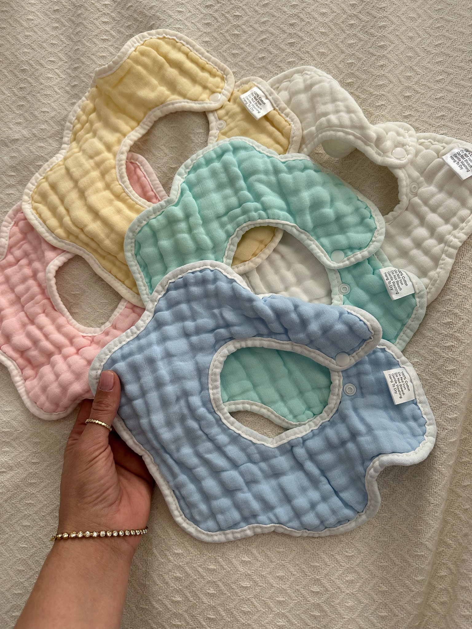 A new fav for the drool / teething baby stage! Muslin baby bibs are in constant rotation (and these ones come in the cutest colors)🌸🩵✨☁️

#LTKBaby