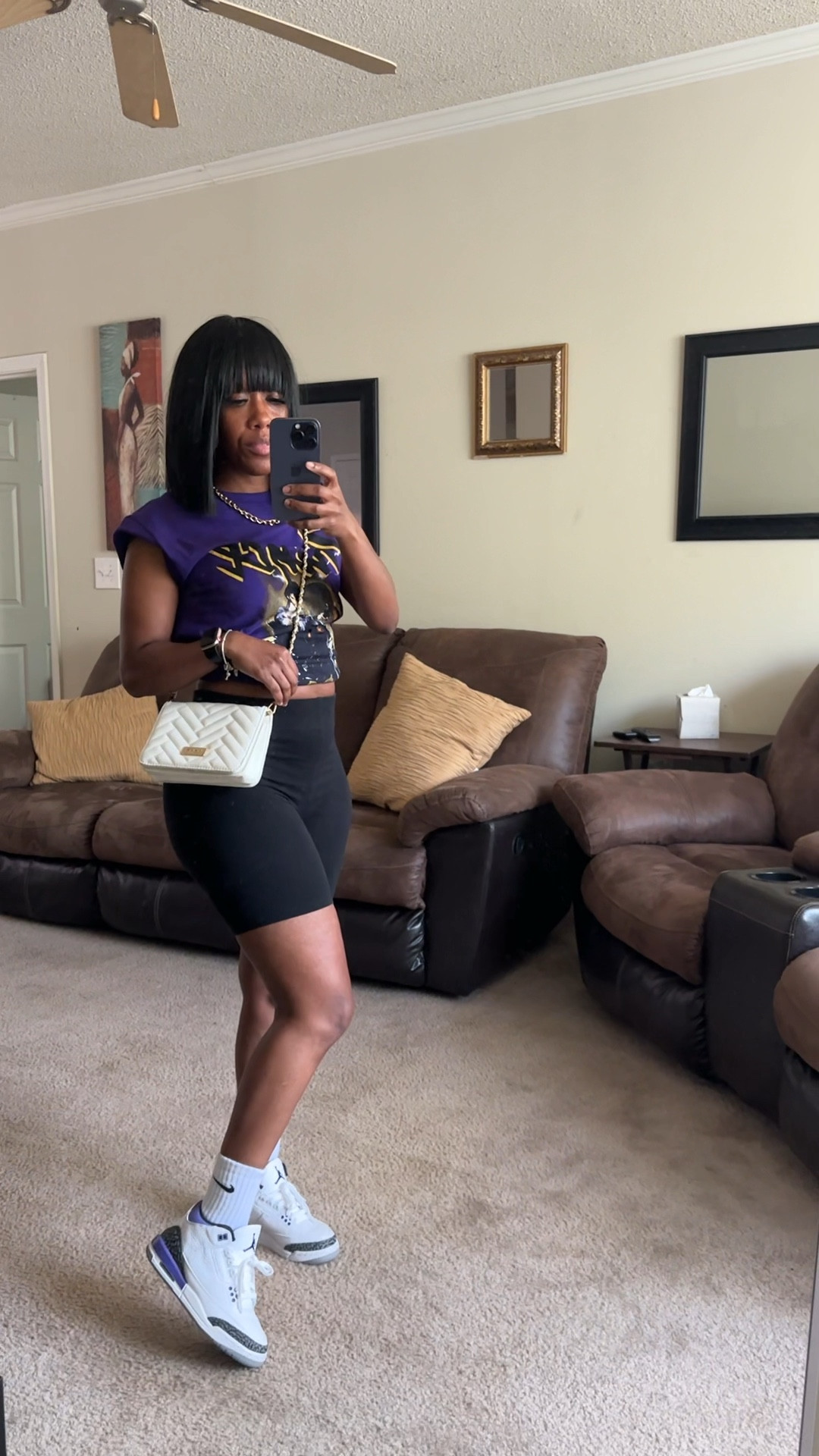 Summer outfit idea.

I’m wearing a size small purple Prince graphic tee with black biker shorts in a size small.

I styled this casual outfit with a beige crossbody bag and Jordan 3 dark iris

#LTKStyleTip #LTKShoeCrush #LTKSeasonal