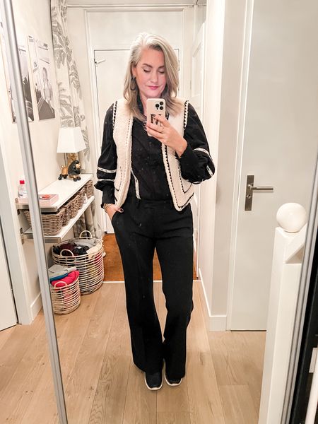 Outfits of the week 

Black embroidered puff sleeve blouse is from Shoeby, the teddy or Sherpa vest/gilet fits tts (I wear a medium) and the black wool trousers are from Zara (xl) and I had the hems let out for additional length. 

#LTKeurope #LTKstyletip #LTKworkwear