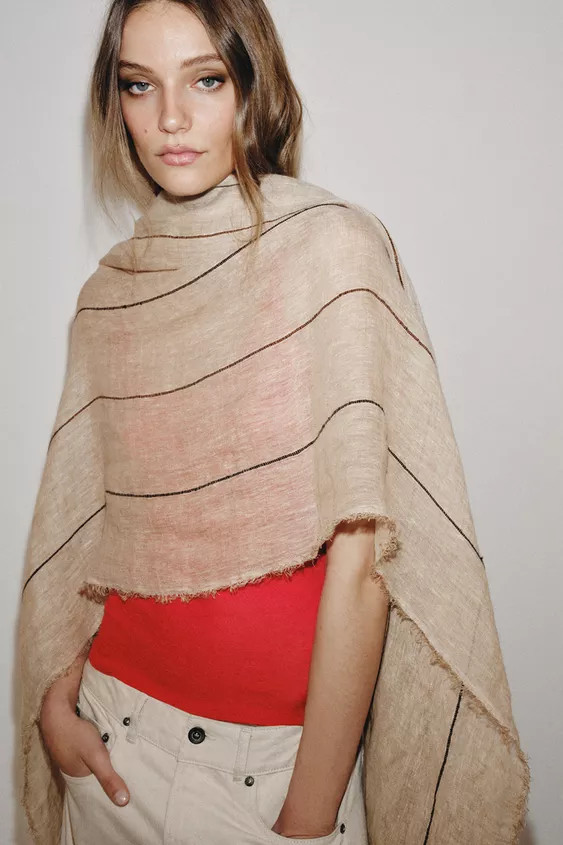 Scarf with main fabric made of 100% linen yarn. Contrasting combined stripe detail. Frayed finish... | Zara US