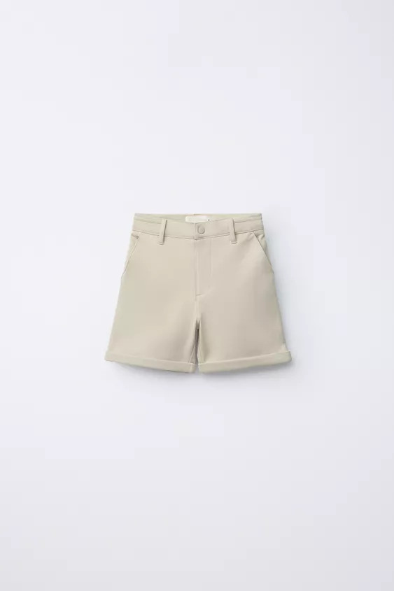 Shorts with adjustable interior waistband and front snap button closure. Front pockets and back p... | Zara US